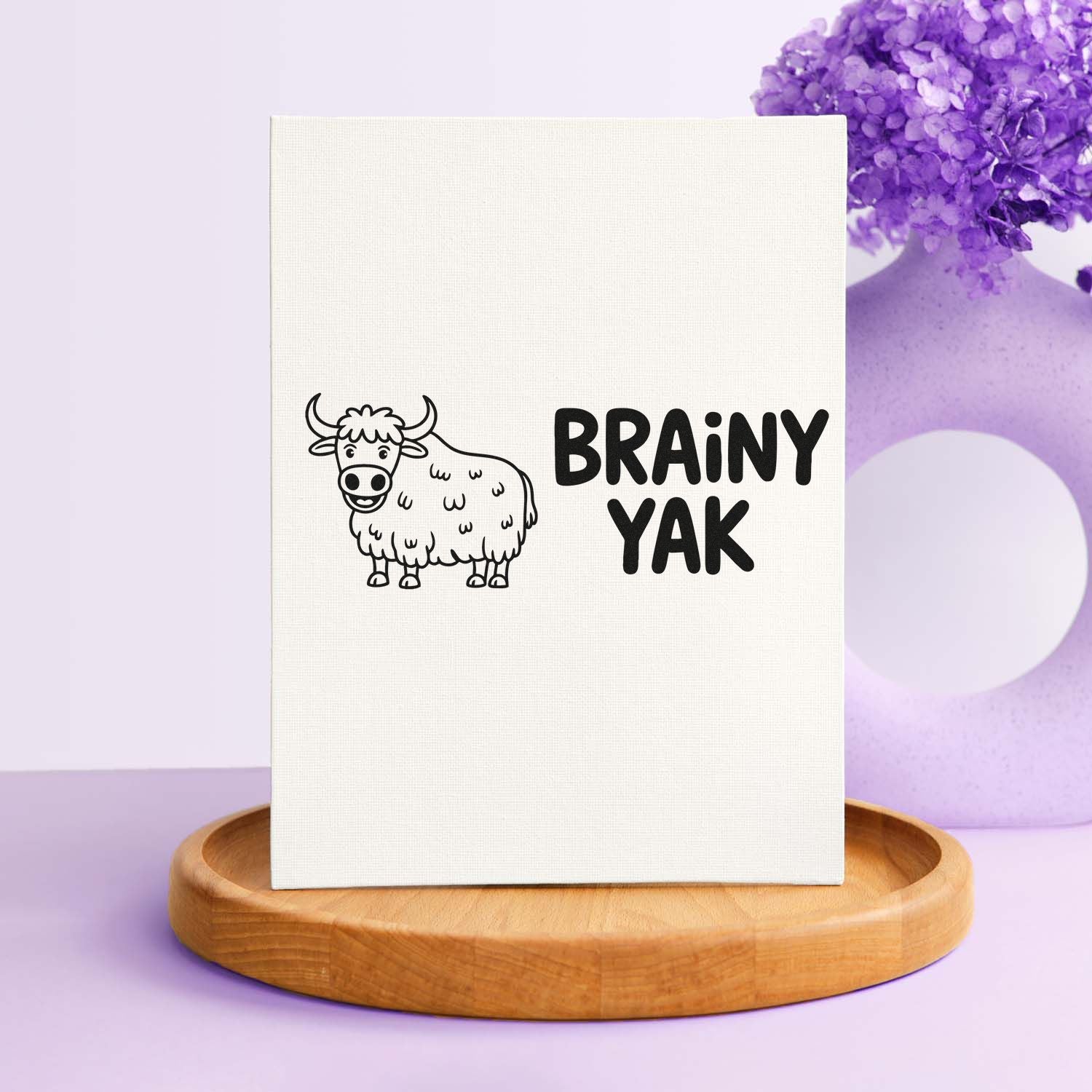 Brainy Yak custom rubber stamp design featuring a cartoon yak and bold text for crafts, packaging, and stationery.