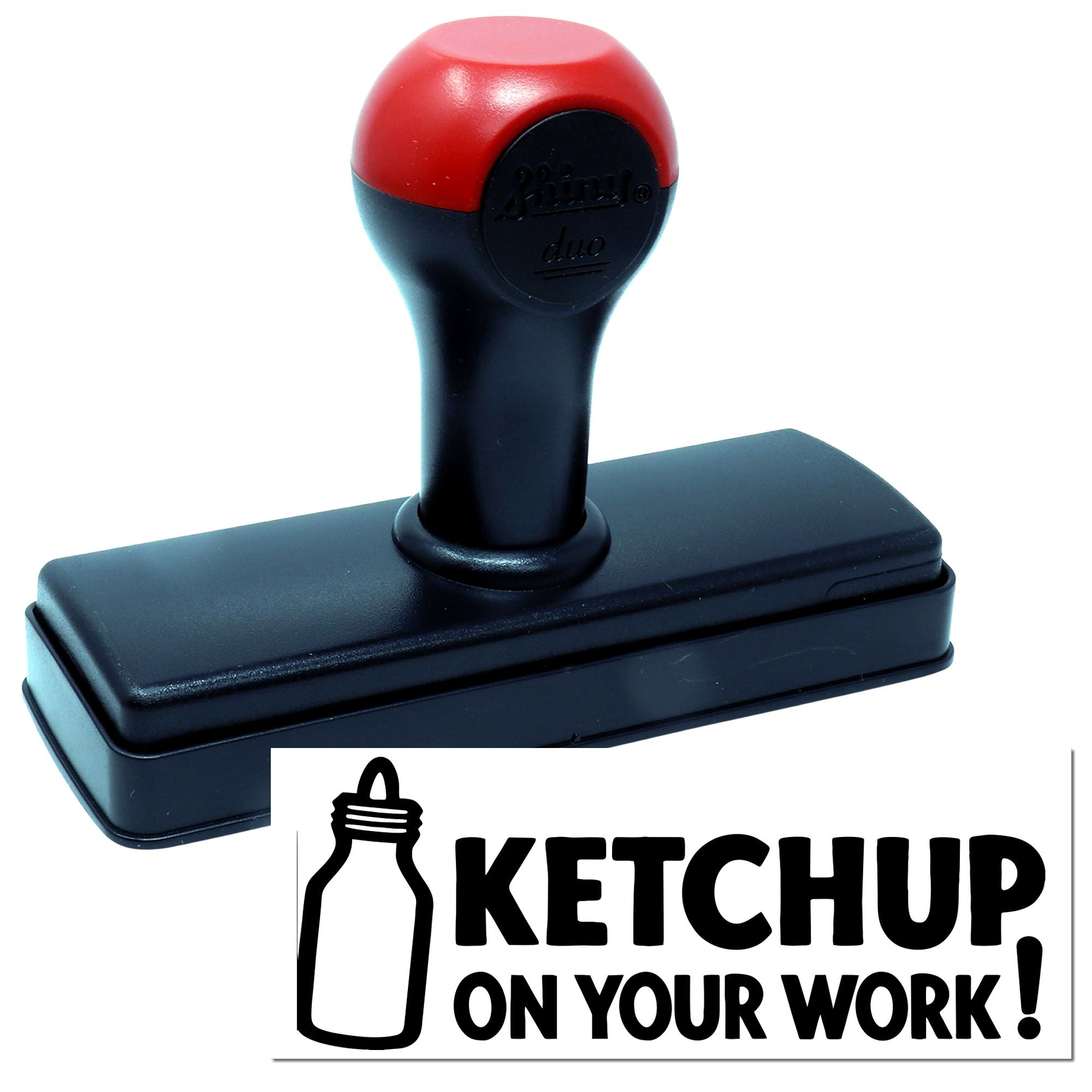 Custom self-inking rubber stamp with ketchup graphic and Ketchup on Your Work! imprint for novelty branding or packaging.