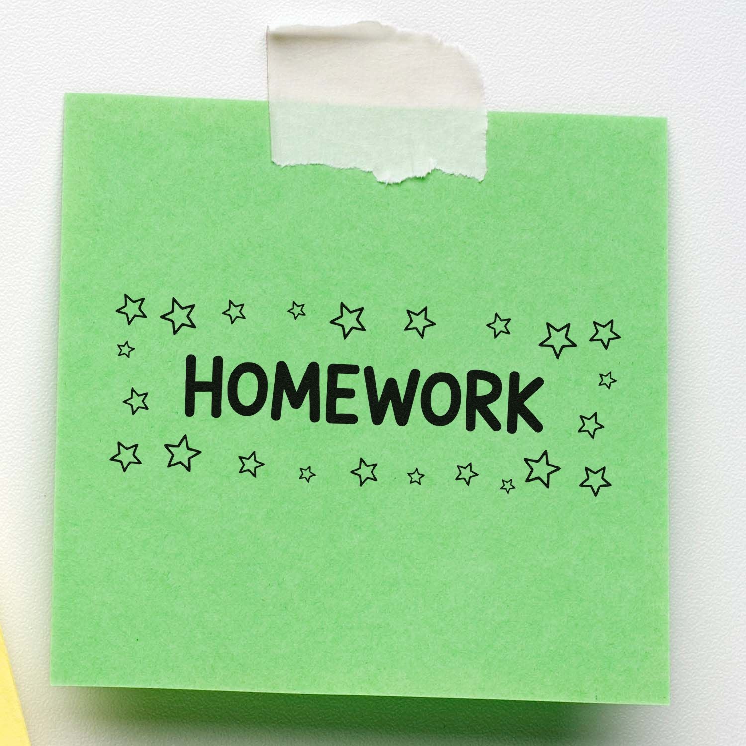 Homework stamp with star border on green note, ideal for teachers grading student assignments.