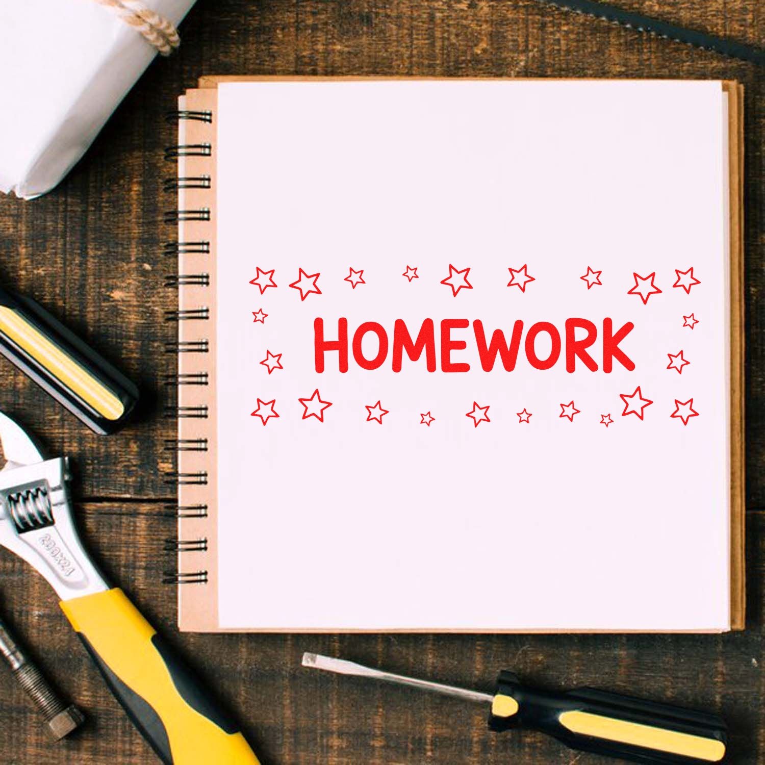Homework rubber stamp design with red stars on a notebook, perfect for grading, teacher feedback, and classroom organization.