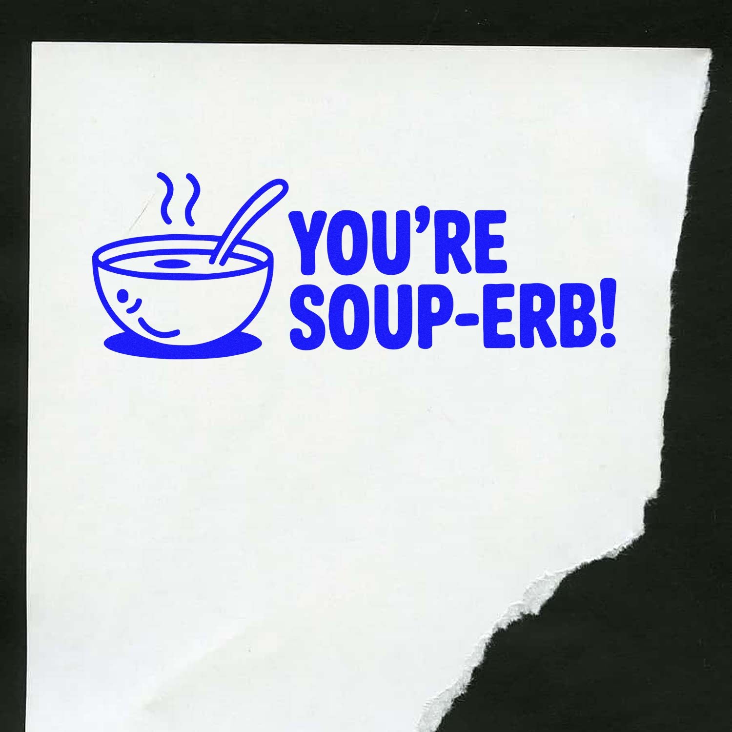 Blue rubber stamp design with a steaming soup bowl and Youre Soup-erb! pun text on white paper.
