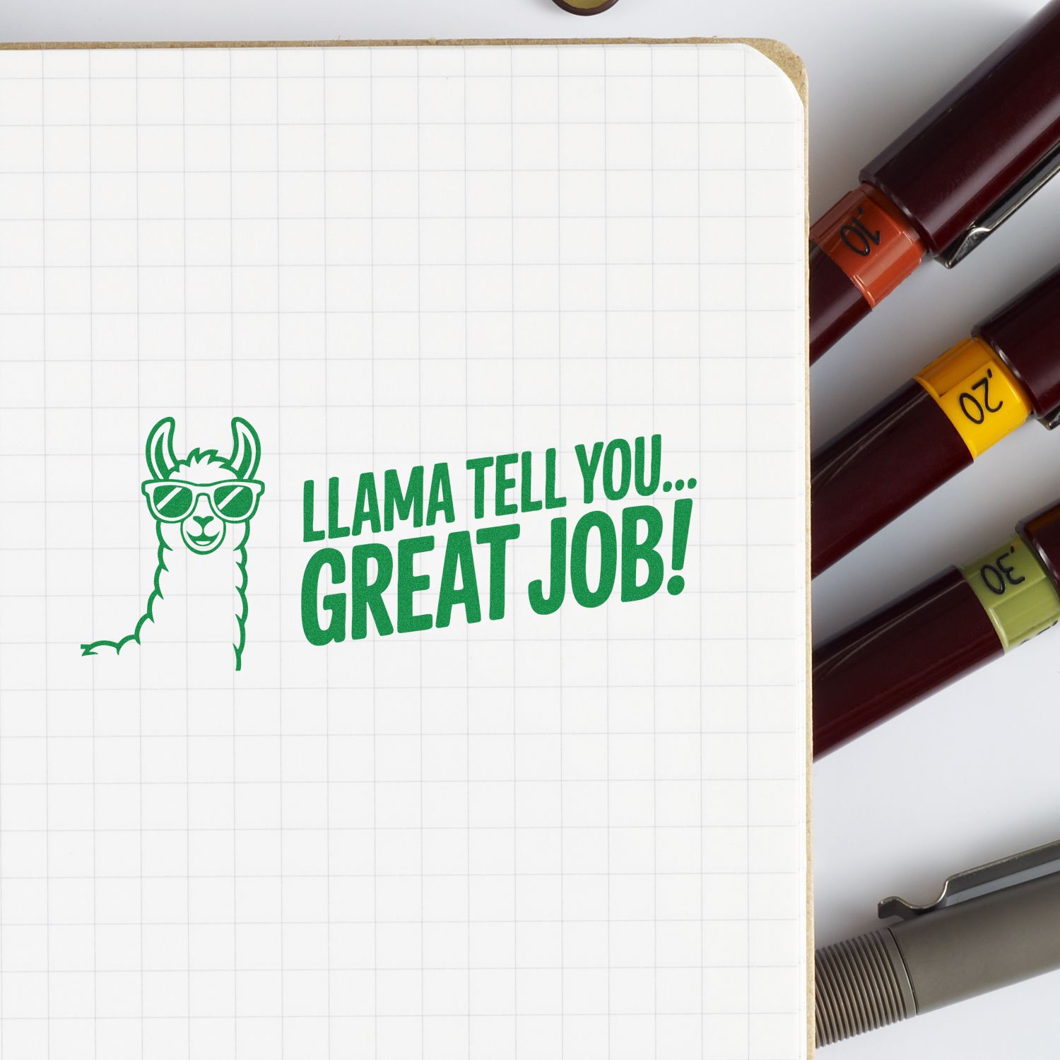 Cute llama Great Job rubber stamp sample on notebook for teacher rewards and motivational stamping.