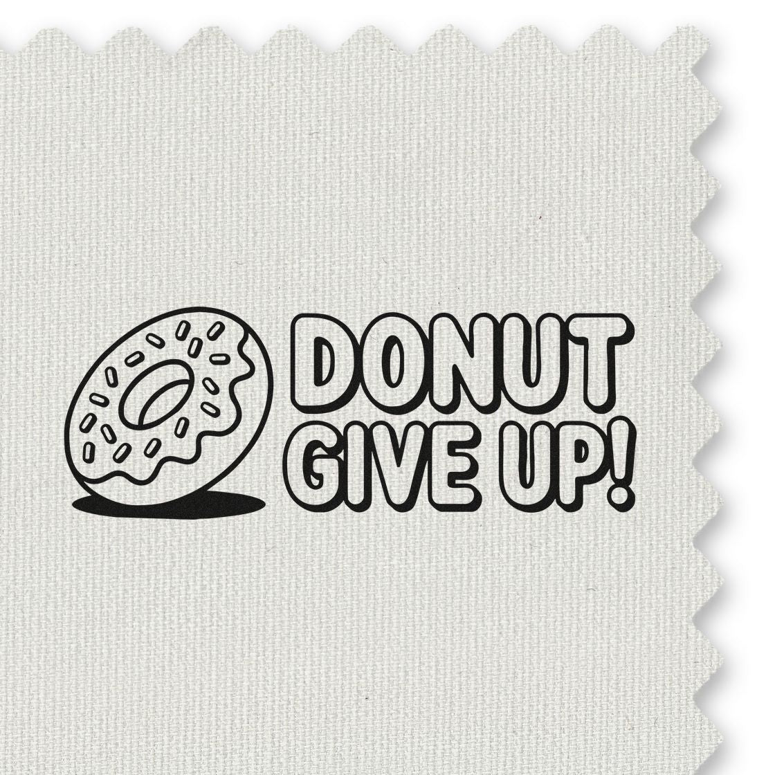 Motivational Donut Give Up rubber stamp design with donut icon and pun text on fabric background.