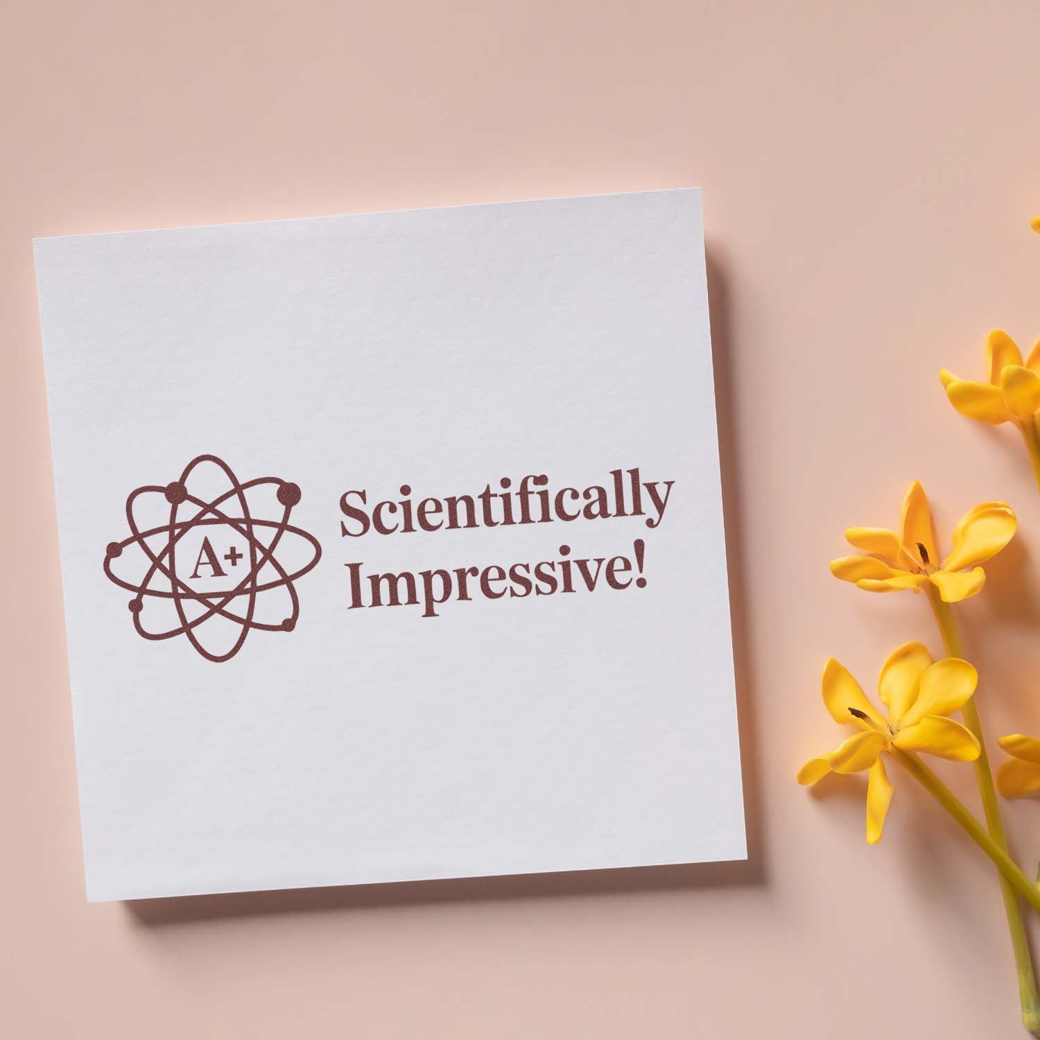 Scientifically Impressive! A+ atom rubber stamp for science teachers, classroom grading, and student reward marks.