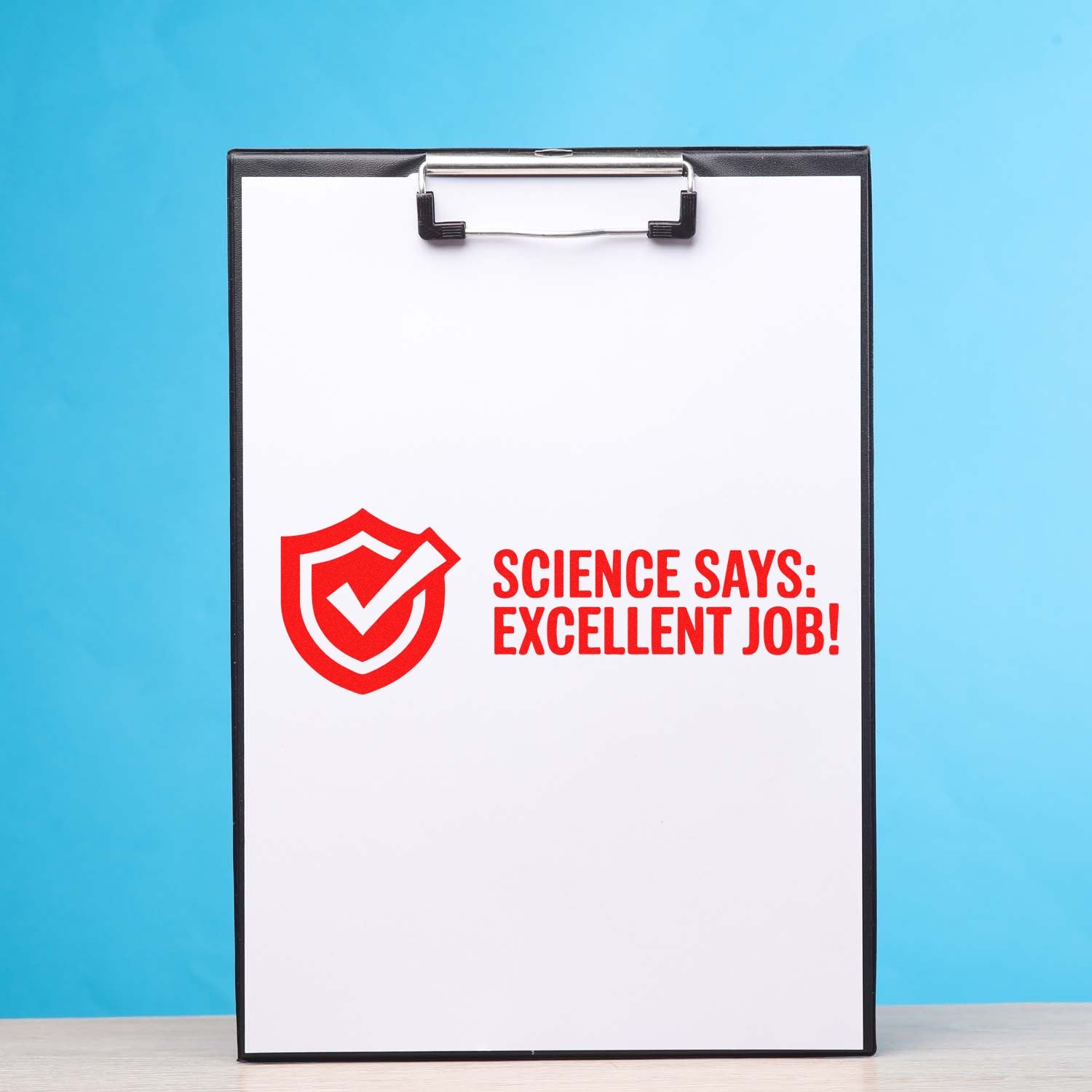 Science Says Excellent Job rubber stamp design on clipboard, ideal for teacher rewards and classroom feedback.
