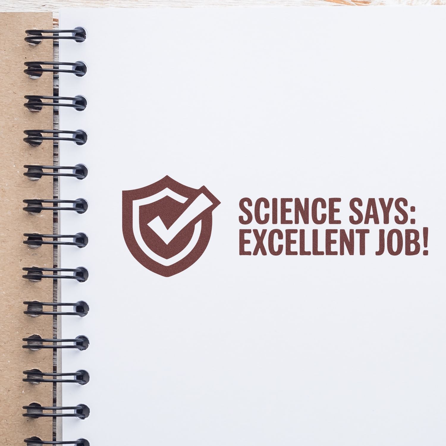 Science says: Excellent job! motivational rubber stamp design with shield checkmark on a notebook page