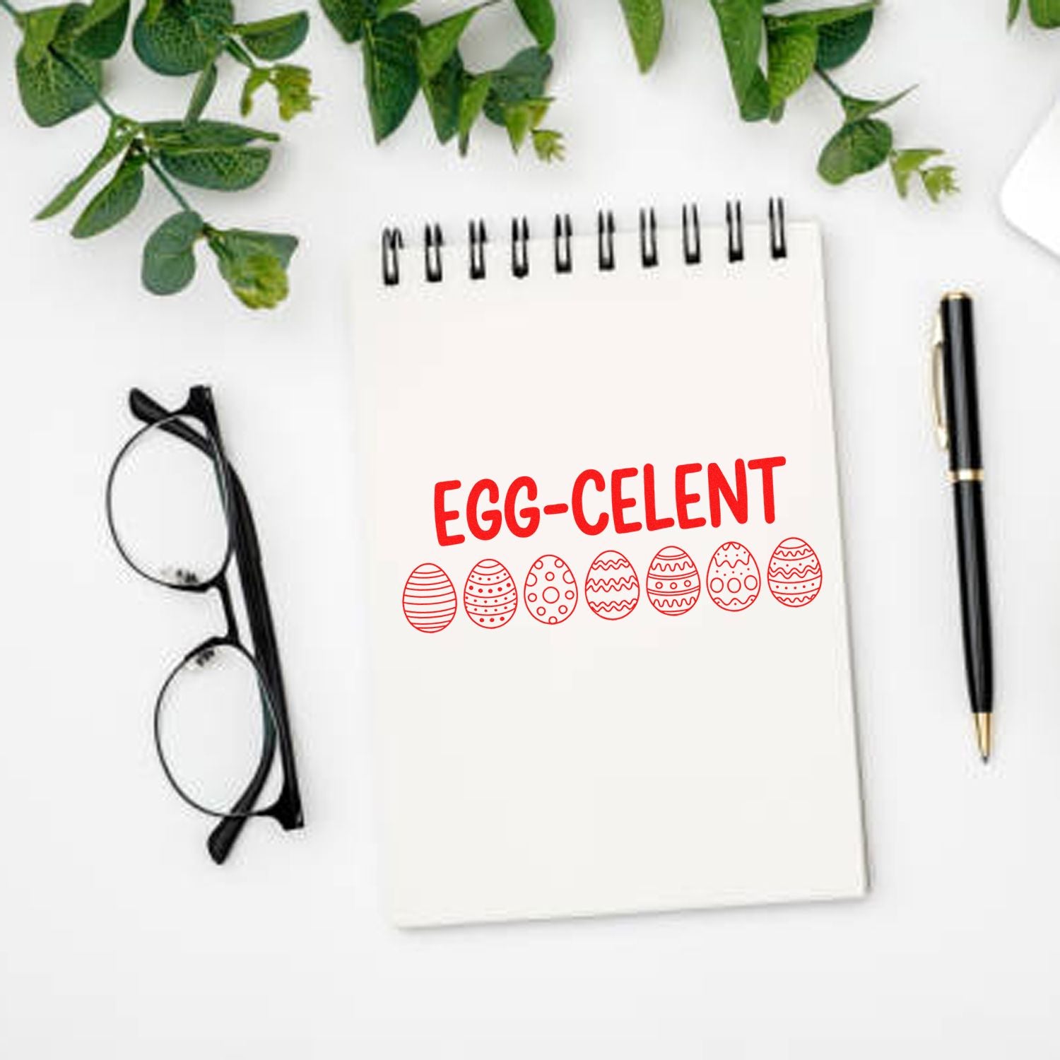 Easter egg-celent rubber stamp design on notebook, perfect for spring cards, planner decorating, and holiday crafts.