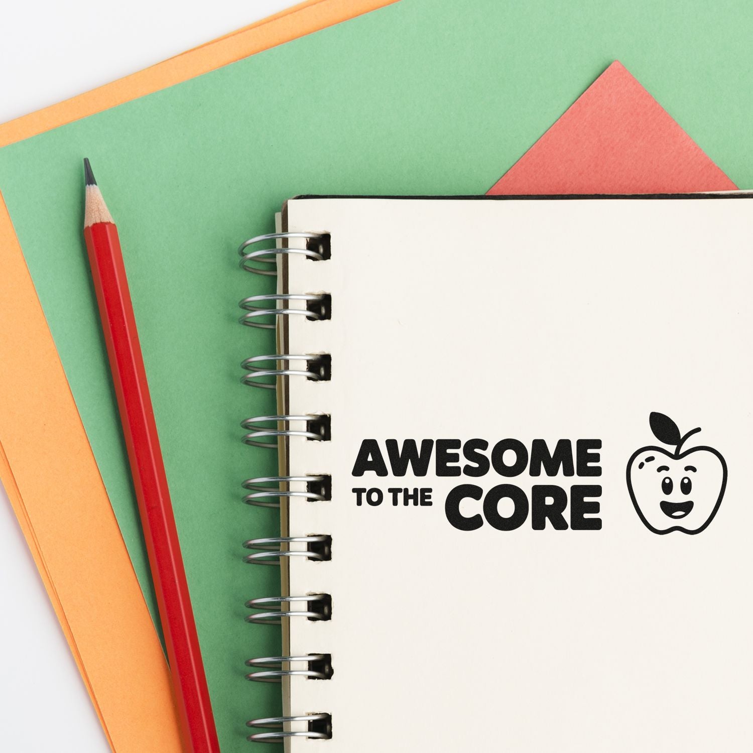 Awesome to the Core apple rubber stamp design on notebook, perfect for teacher rewards, school crafts, and classroom use.