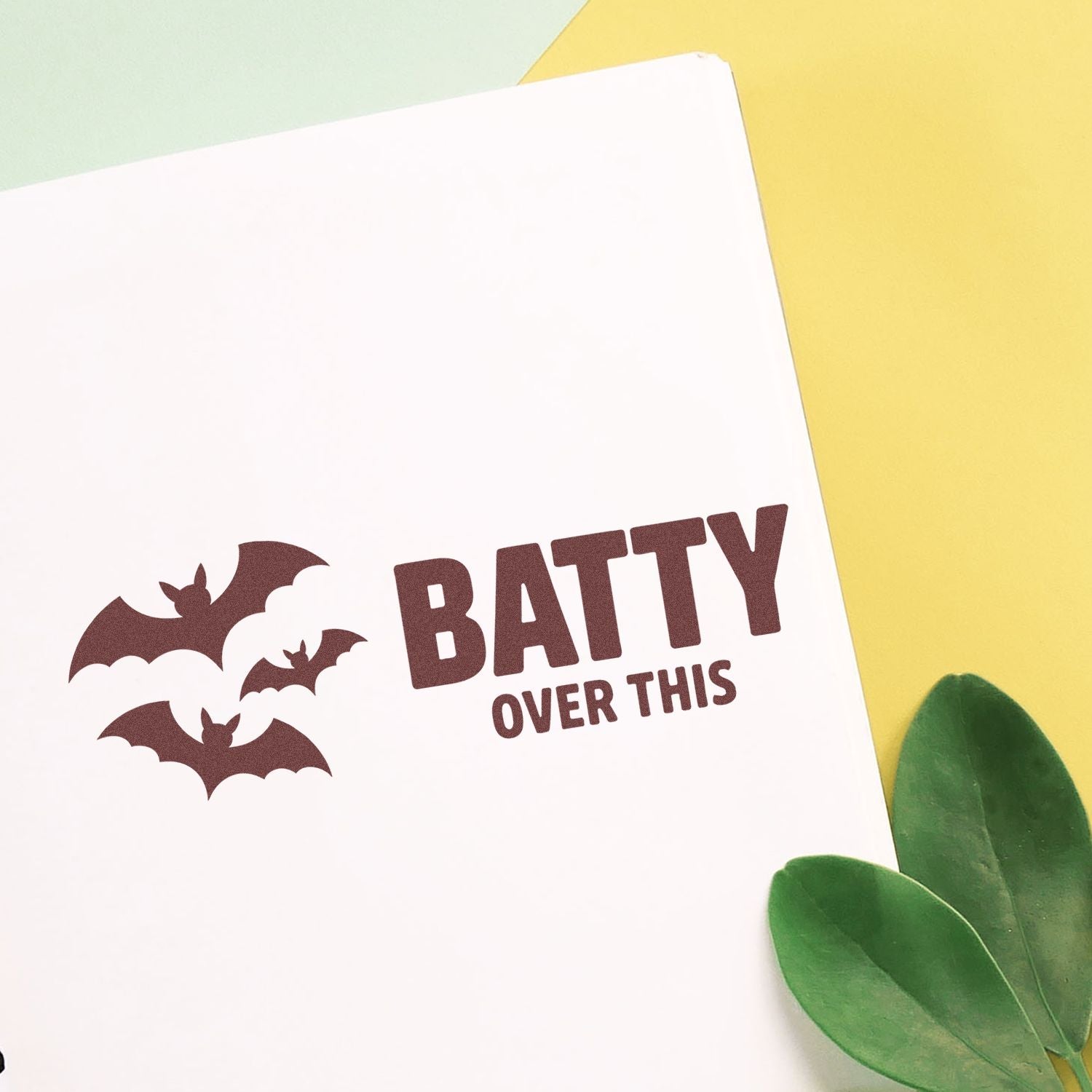 Batty over this rubber stamp design with bat silhouettes, perfect for Halloween cards, scrapbook pages, and spooky crafts.