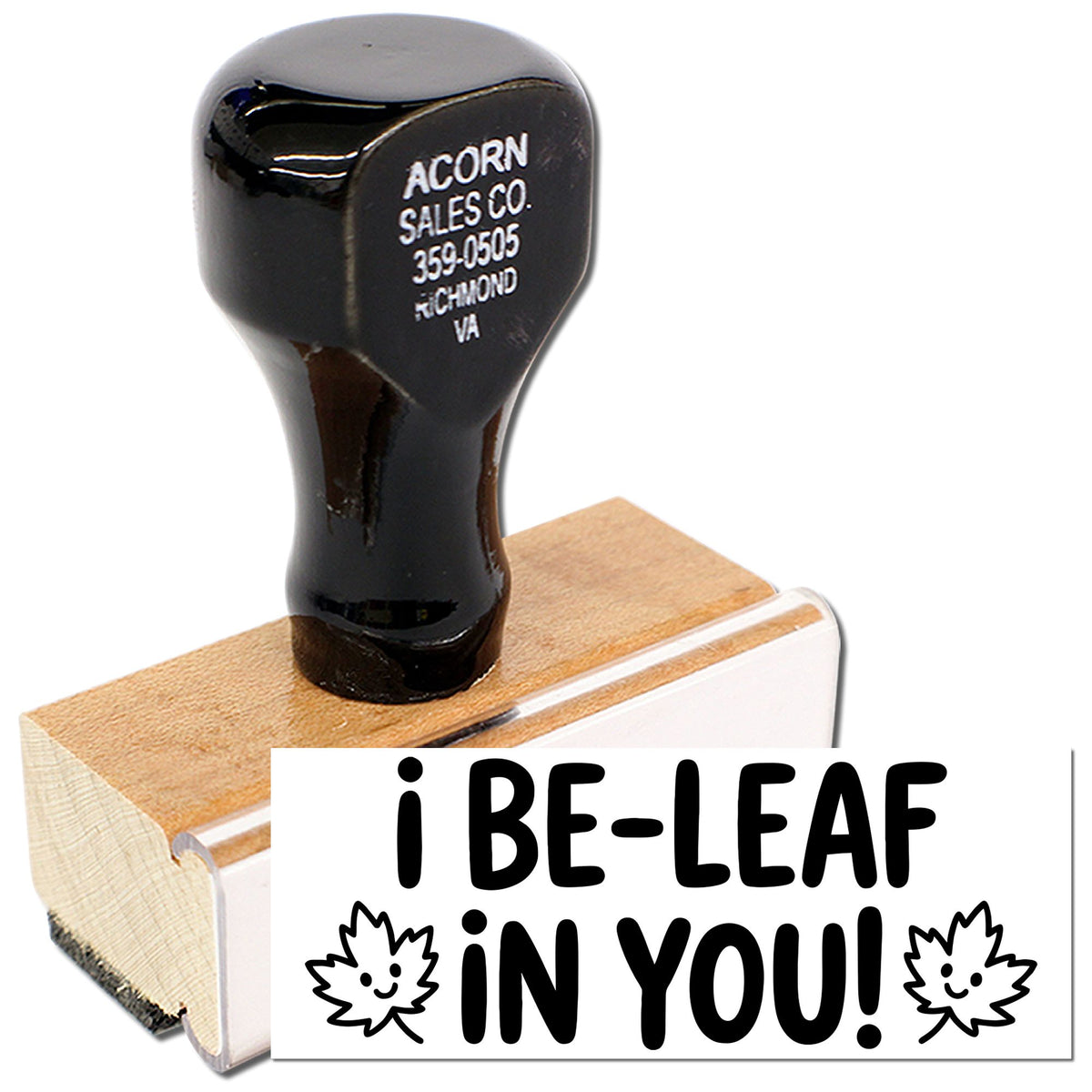 Custom wooden rubber stamp with I BE-LEAF IN YOU! leaf design for teachers, crafts, and motivational messages.