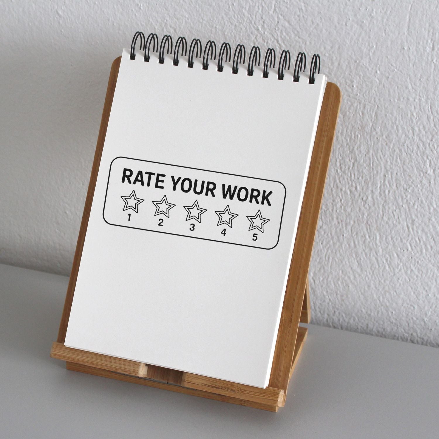 Rubber stamp reading "Rate Your Work" with 1-5 star rating, ideal for teacher feedback and classroom assessment.