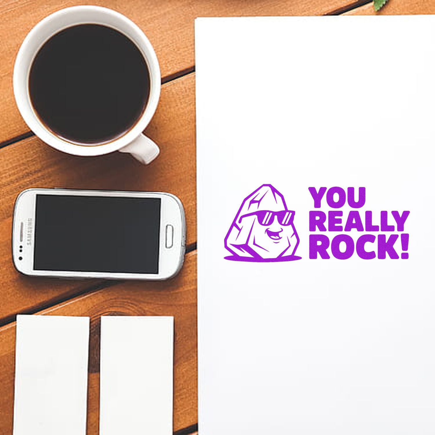 Purple You Really Rock! rubber stamp impression on paper, ideal for customer appreciation and motivational office use.