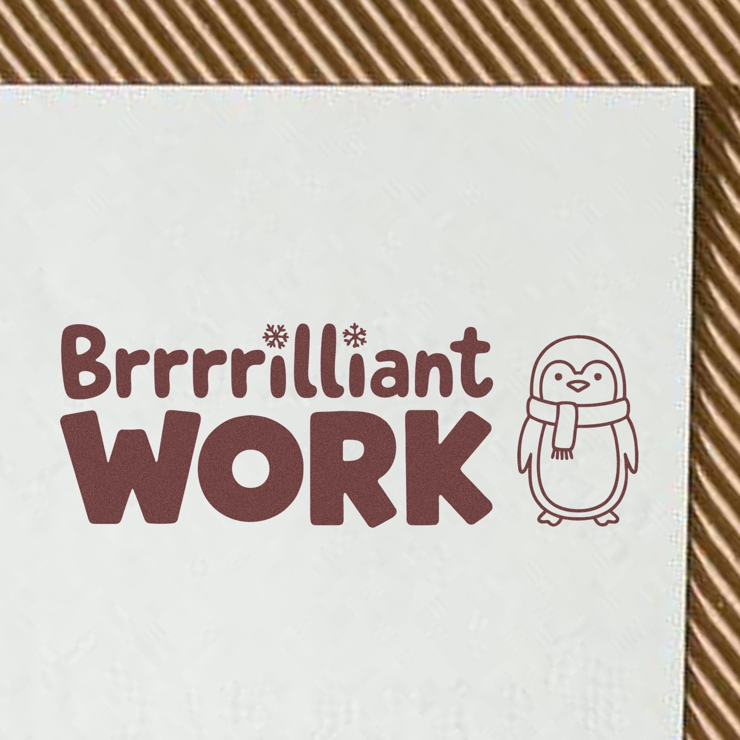 Brrrrilliant Work penguin rubber stamp design for classroom praise, featuring a winter-themed motivational message.