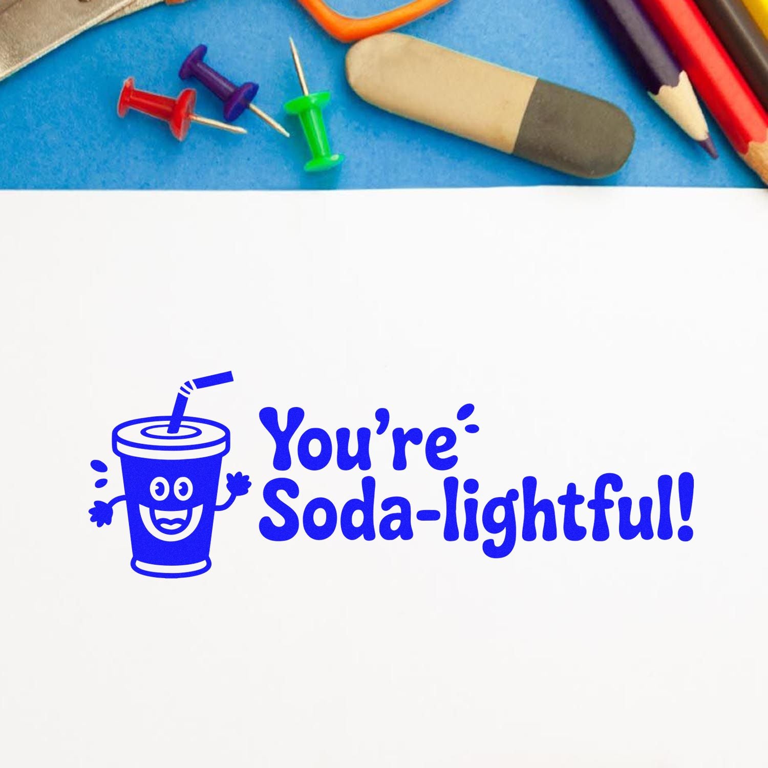 Playful rubber stamp with soda cup and Youre Soda-lightful! text for teacher rewards, classroom crafts, and scrapbook pages.
