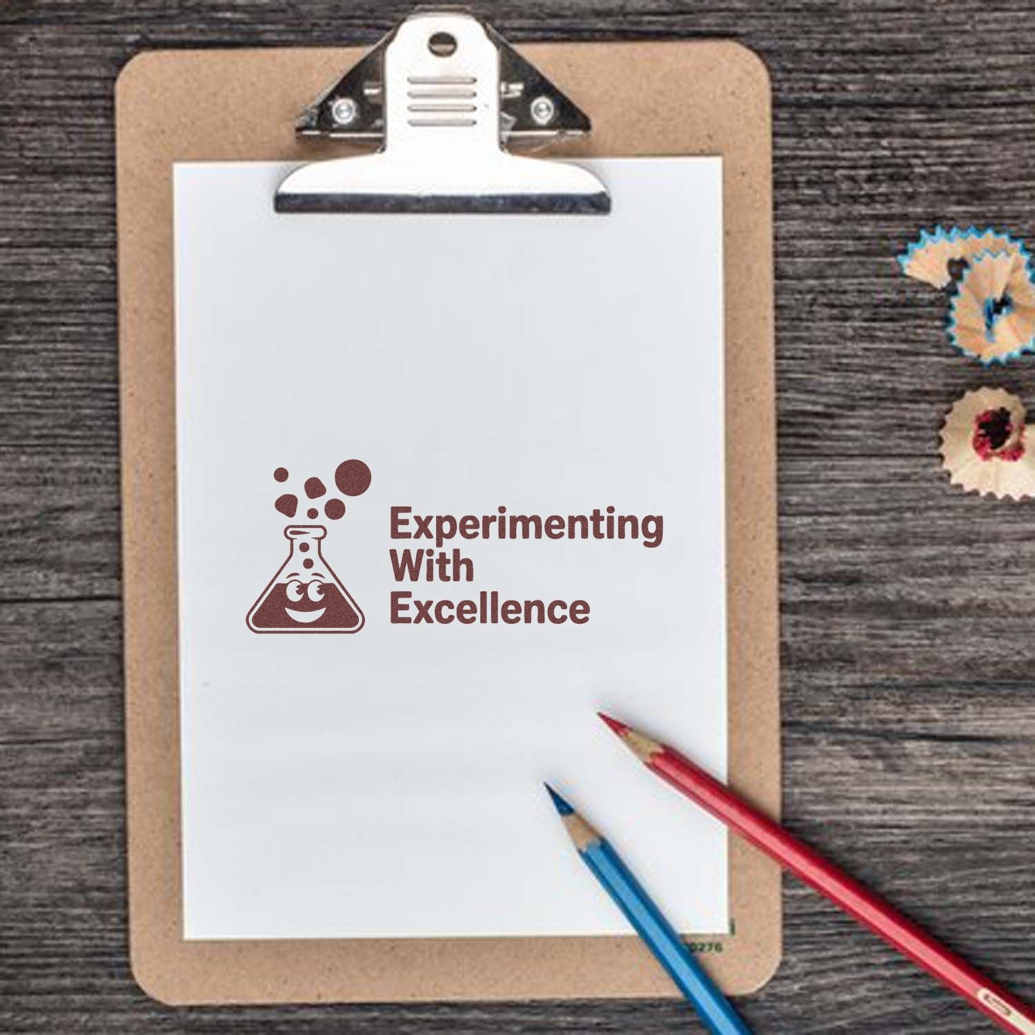 Custom rubber stamp design with science flask logo and Experimenting With Excellence text on clipboard paper.