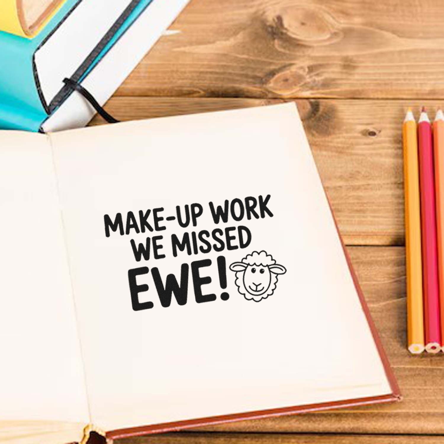 Rubber stamp design for classroom use: Make-up work we missed EWE! sheep stamp on notebook with school supplies.