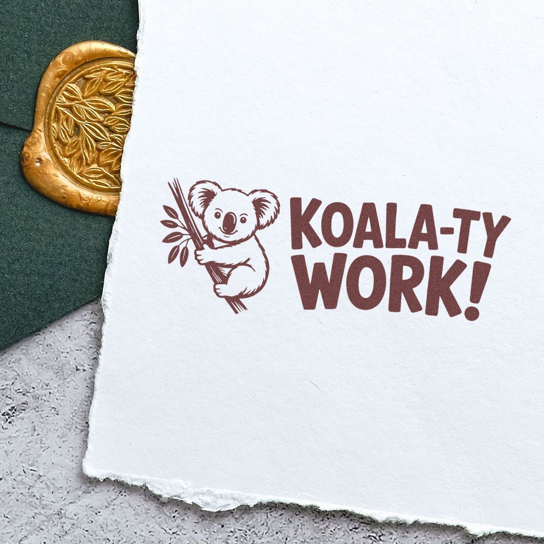 Koala-ty Work rubber stamp impression with koala illustration on paper for fun packaging, stationery, and craft branding.
