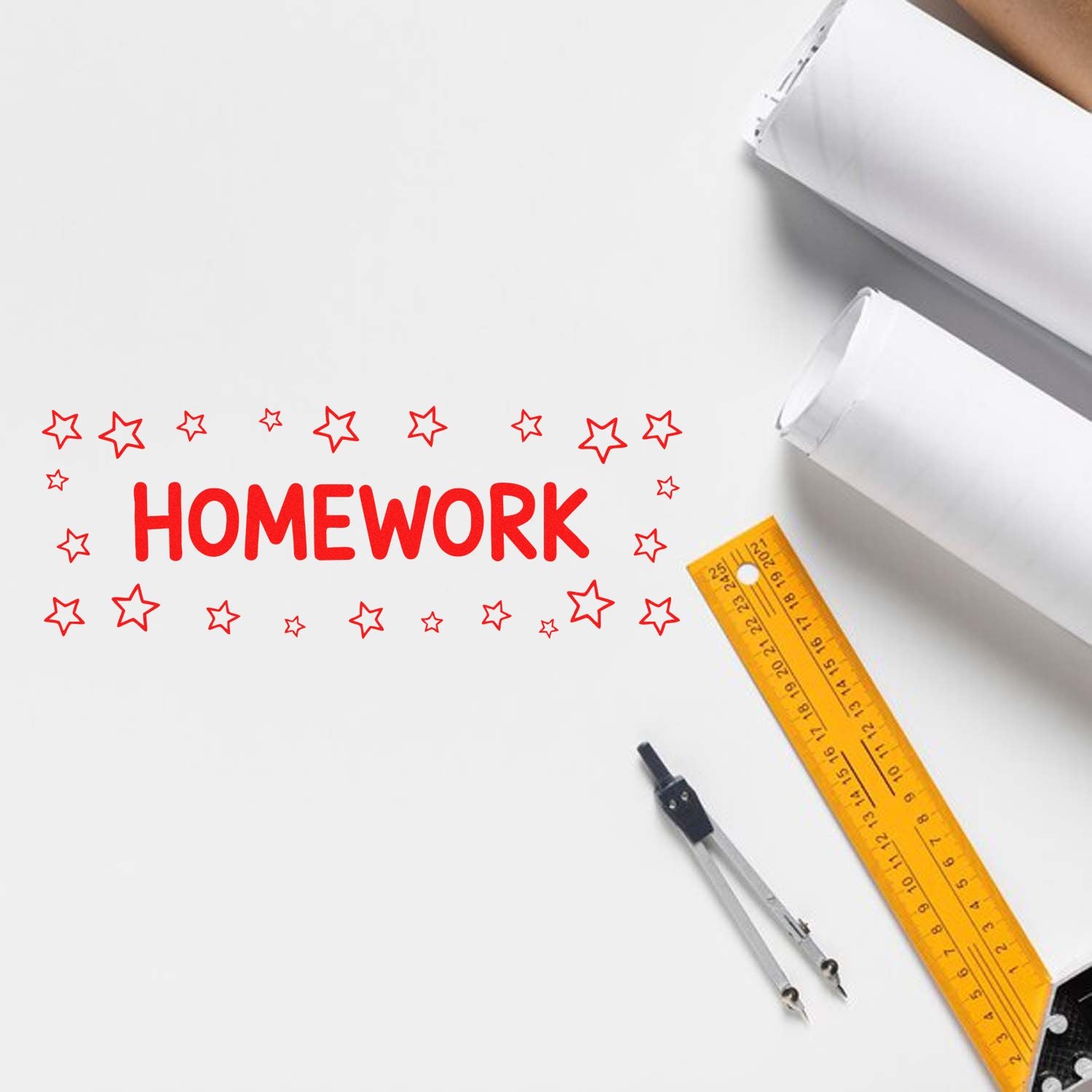 Homework rubber stamp with star border for teacher grading, shown on paper with school supplies.