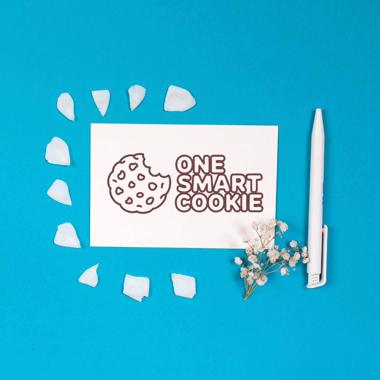 One Smart Cookie rubber stamp design with cookie icon on blue background, ideal for bakery, teacher, or reward stamping.