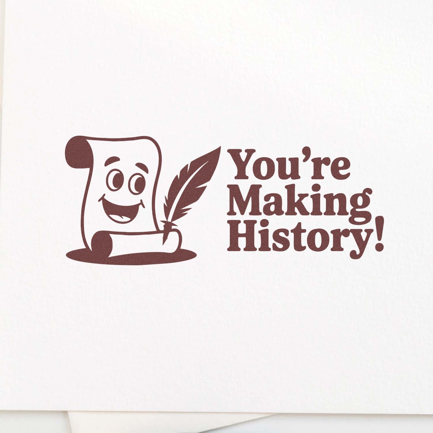 Funny rubber stamp design with smiling scroll and quill, reading Youre Making History! for teacher or office use.