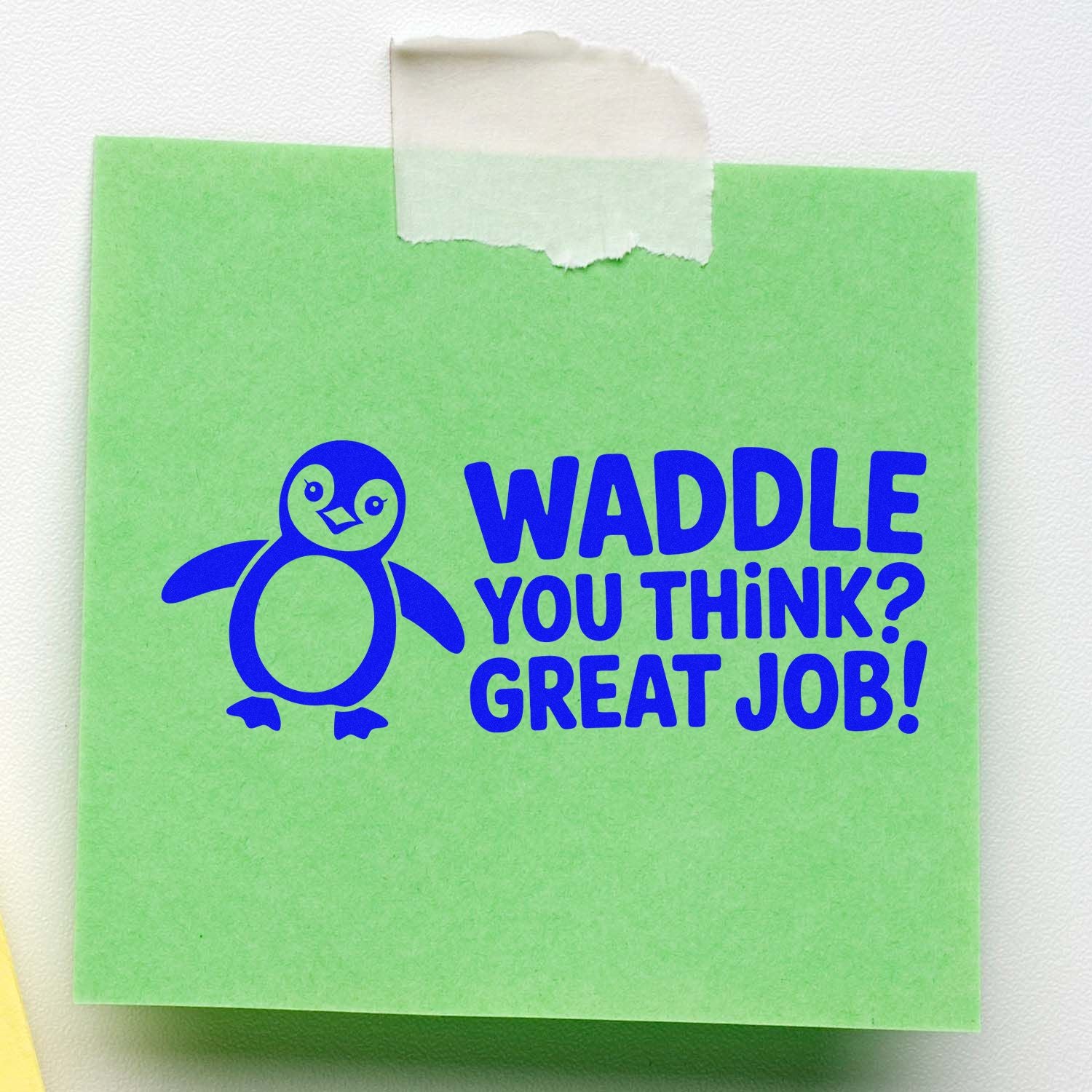 Penguin rubber stamp saying Waddle You Think? Great Job! on green note, perfect for cheerful teacher feedback and rewards.