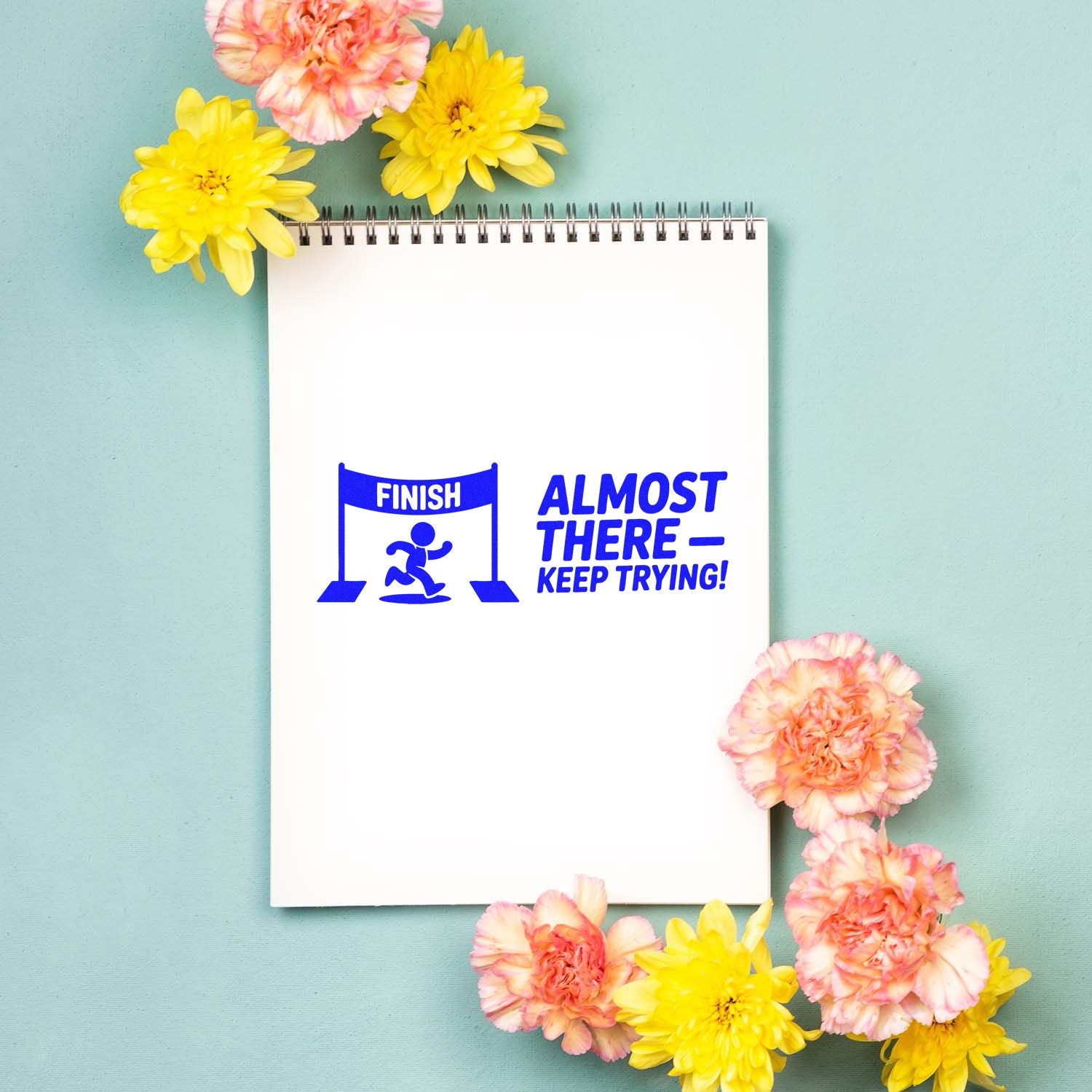 Motivational rubber stamp design with finish line icon and Almost There Keep Trying for planners and journals.