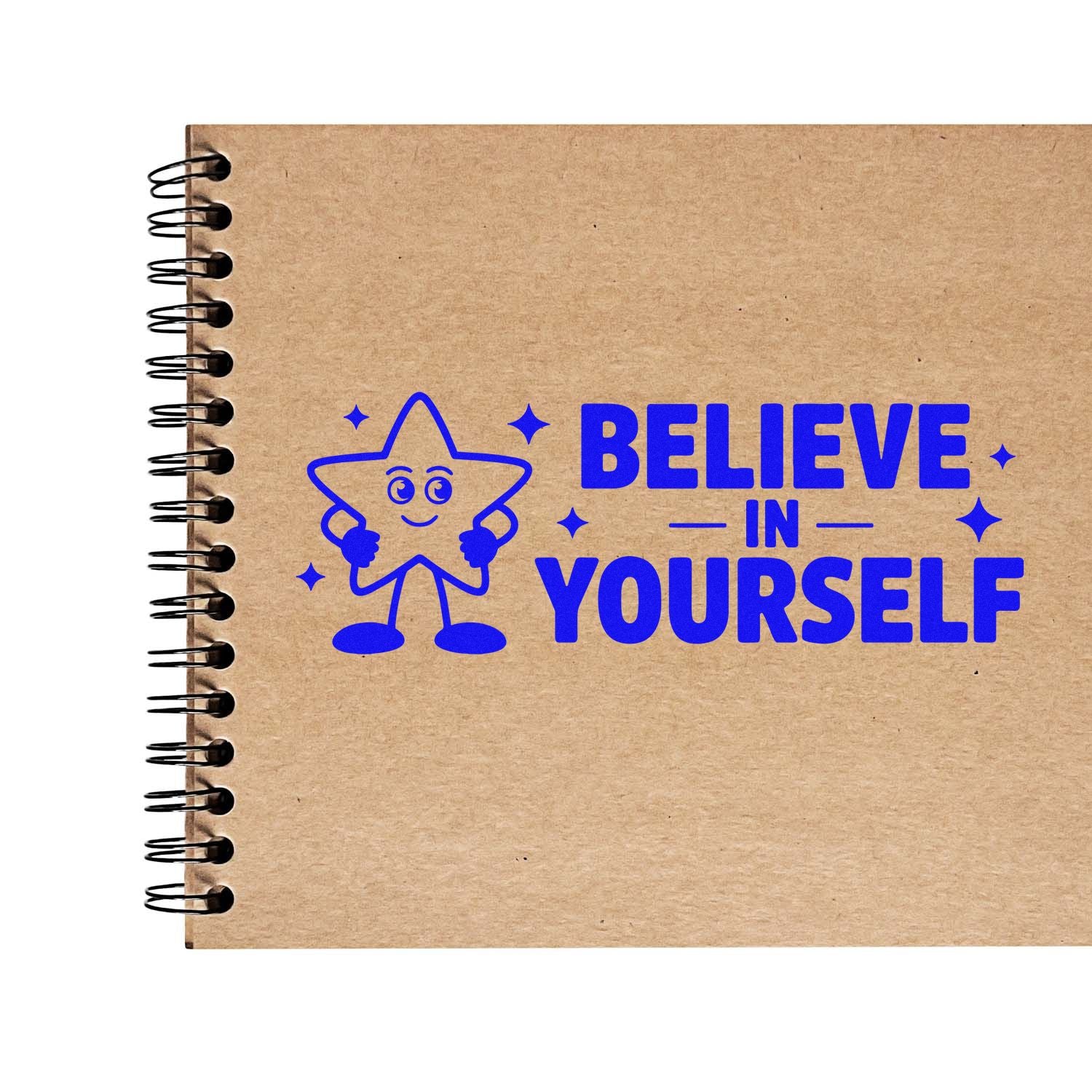 Believe in Yourself rubber stamp design with smiling star character on kraft notebook cover in bold blue.