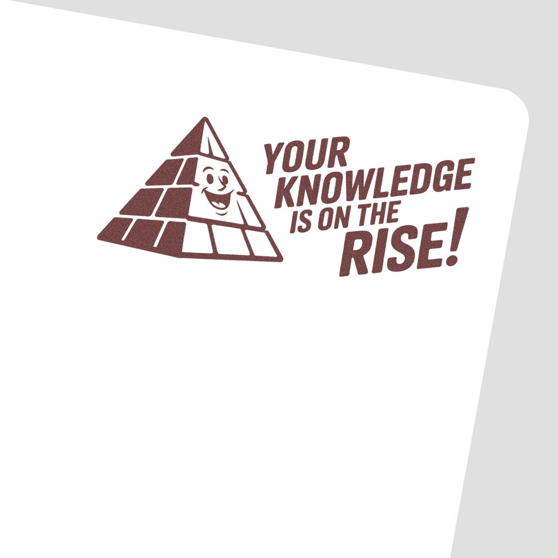 Motivational rubber stamp design with pyramid mascot and text Your Knowledge Is on the Rise for education projects.
