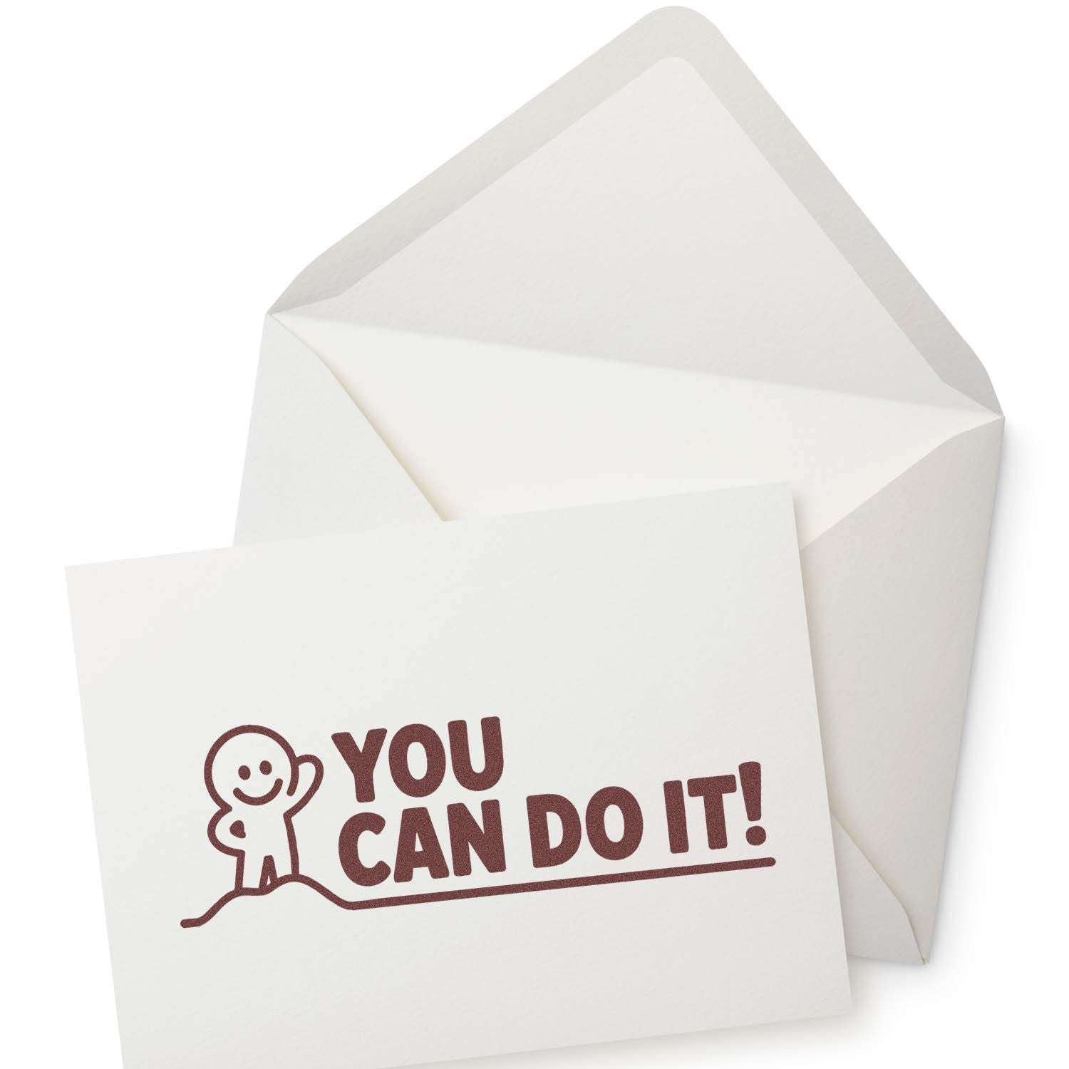 Motivational rubber stamp design with You Can Do It! message on a greeting card and envelope.