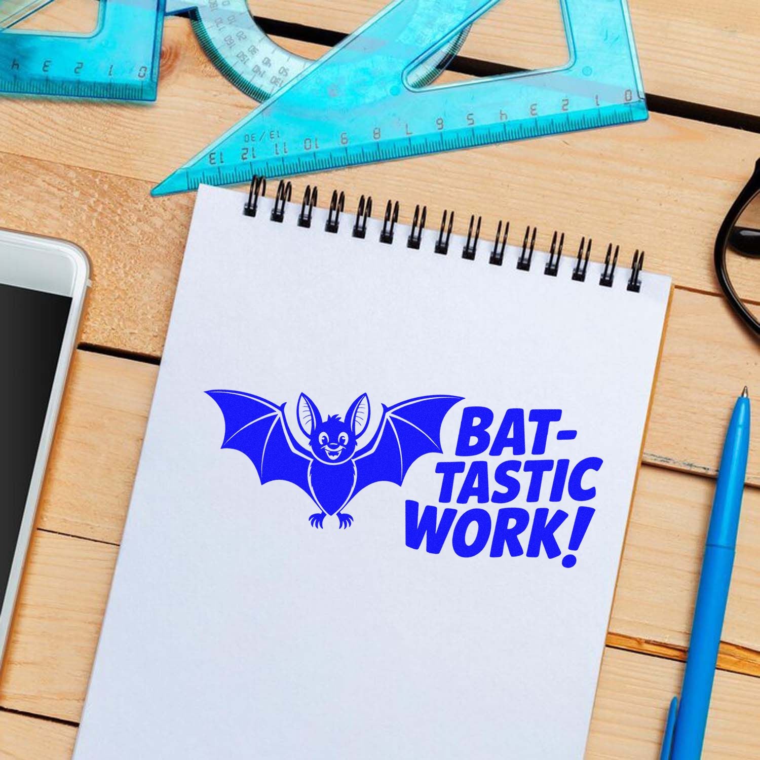 Bat-tastic Work rubber stamp design with smiling bat and bold text, perfect for teachers, classroom rewards, and craft projects.