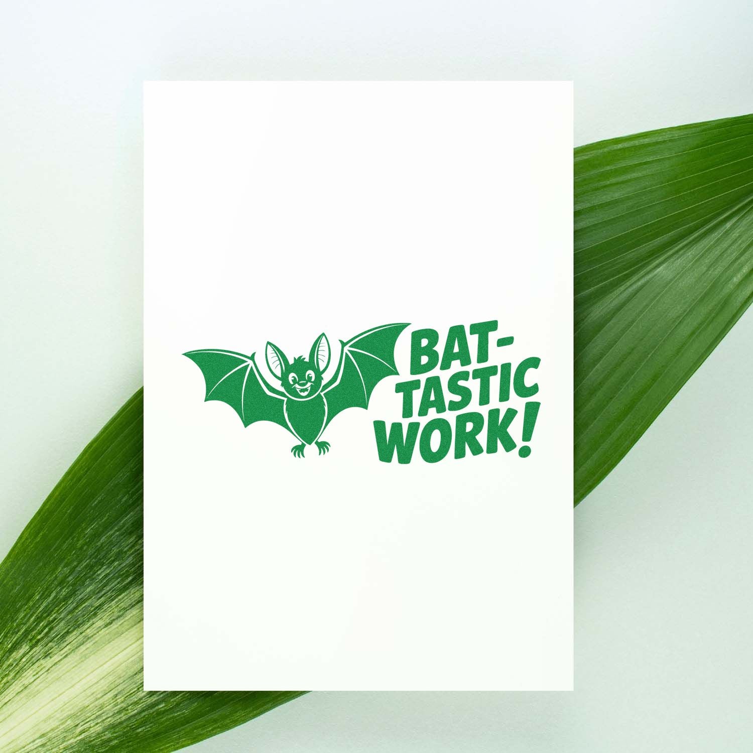Green Bat-tastic Work! rubber stamp design on white card, perfect for teacher rewards, Halloween crafts, and stamping projects.