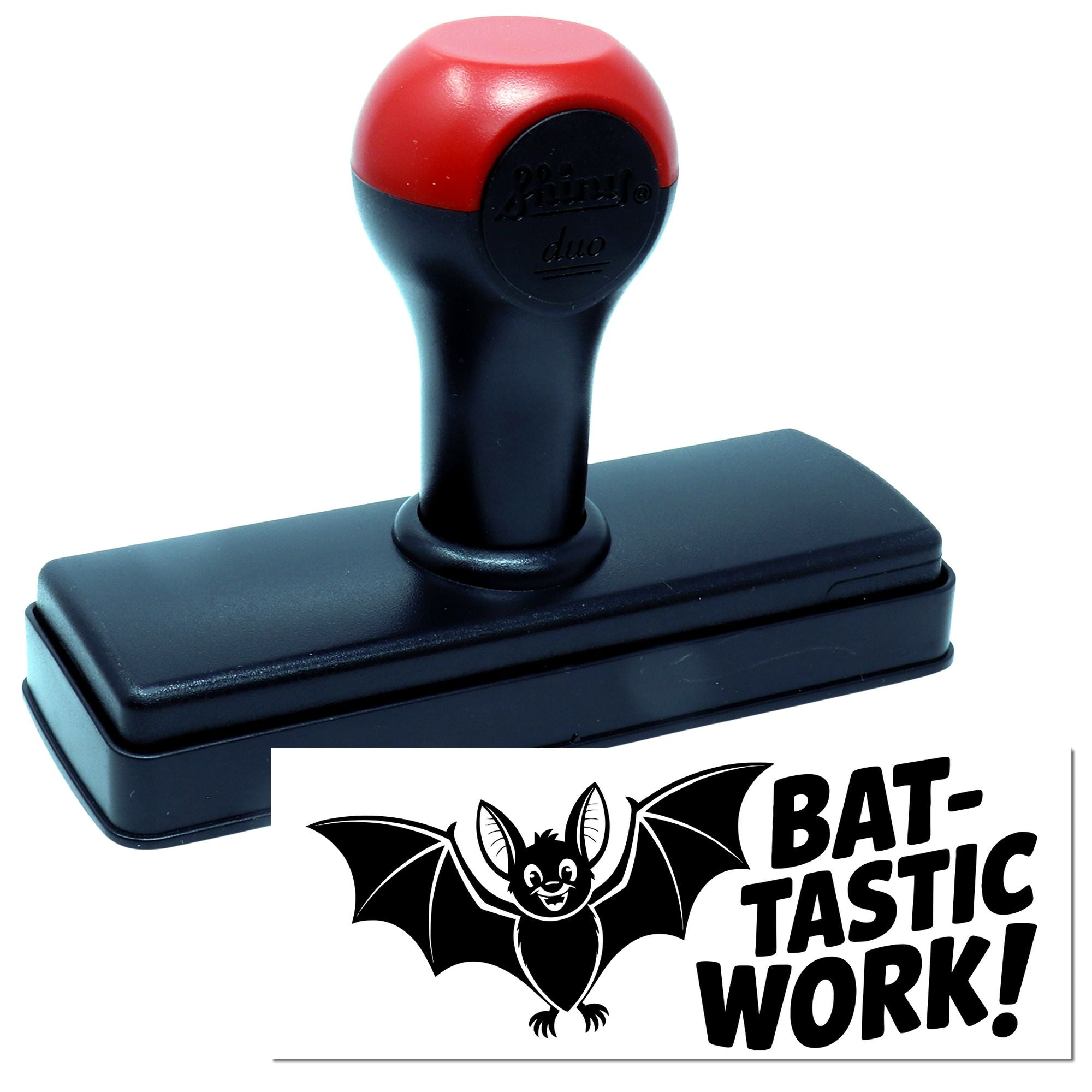 Self-inking rubber stamp with bat design and Bat-Tastic Work! imprint for classroom rewards or office use.
