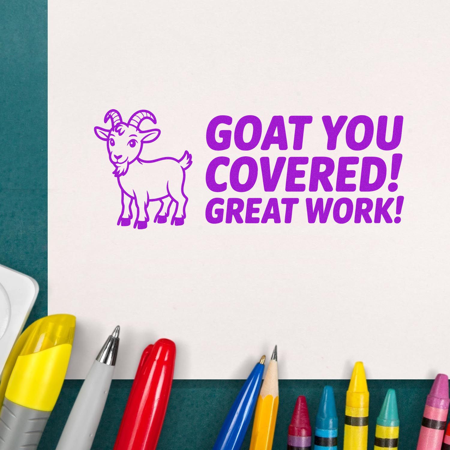 Purple rubber stamp with goat icon and GOAT YOU COVERED! GREAT WORK! message for motivating teacher or office rewards.