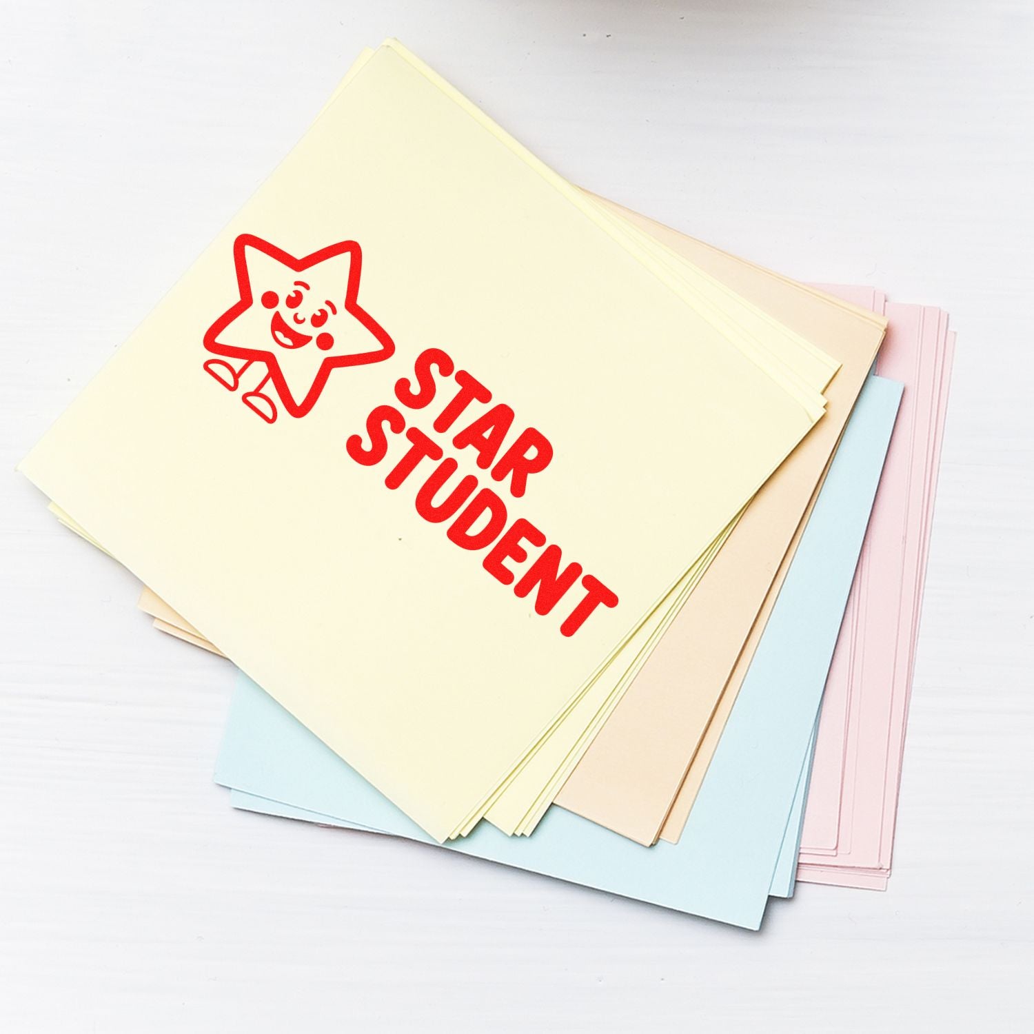 Star Student rubber stamp on colorful paper sheets for classroom rewards, teacher recognition, and student achievement.