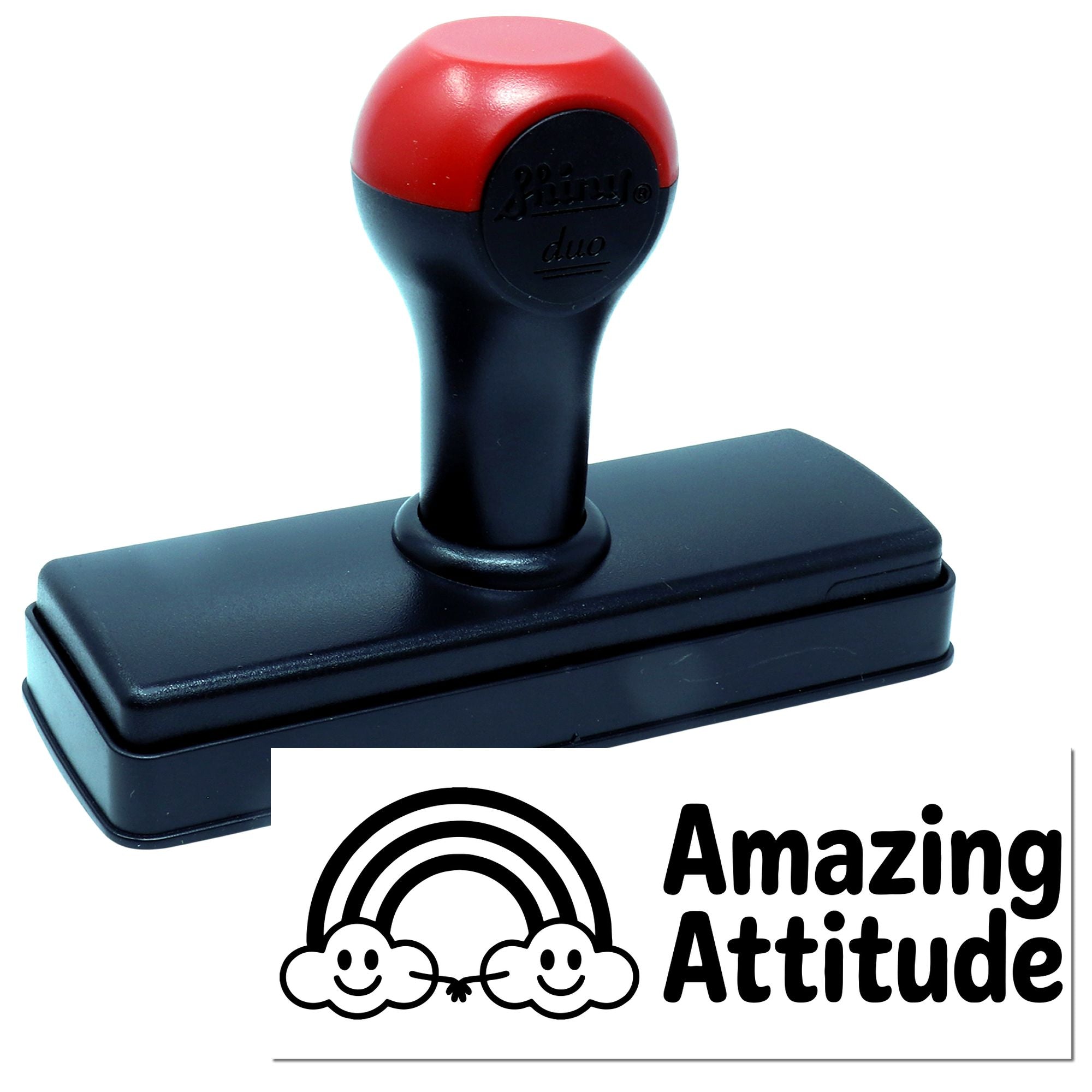Self-inking rubber stamp with Amazing Attitude imprint for classroom rewards and positive feedback.
