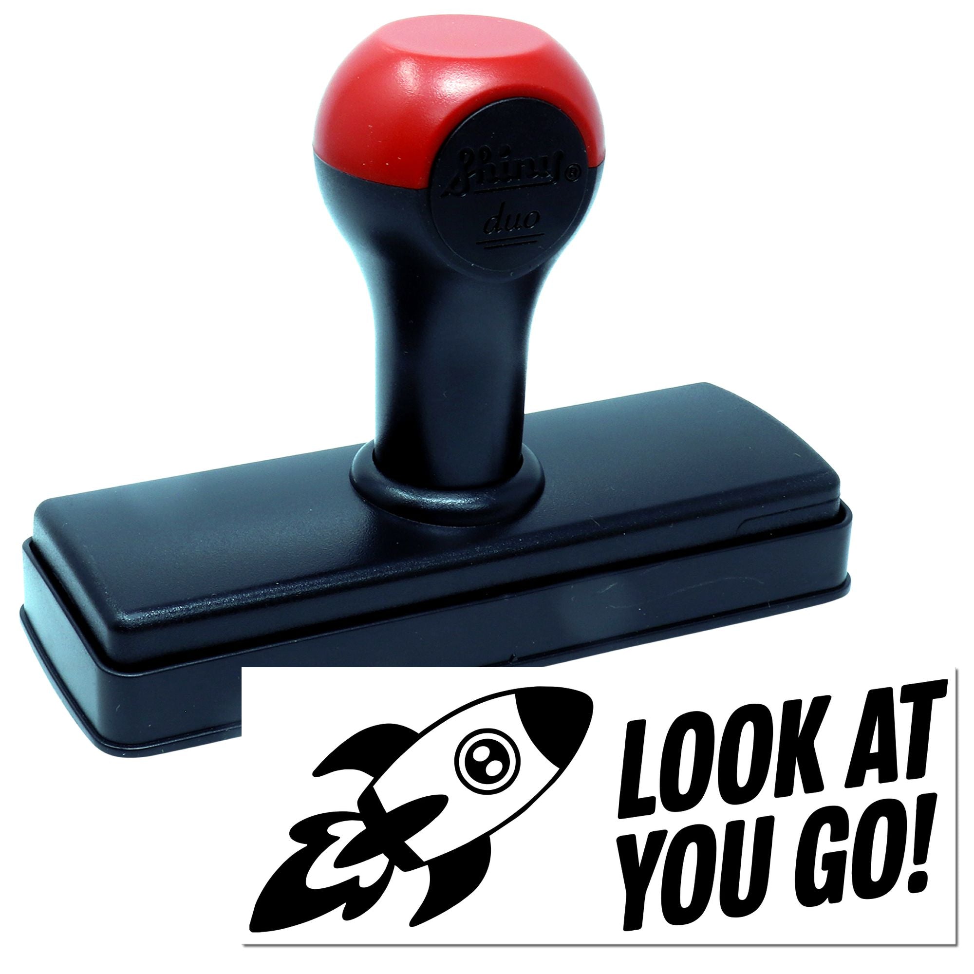 Motivational self-inking rubber stamp with Look at You Go! rocket design for rewarding progress and achievements.