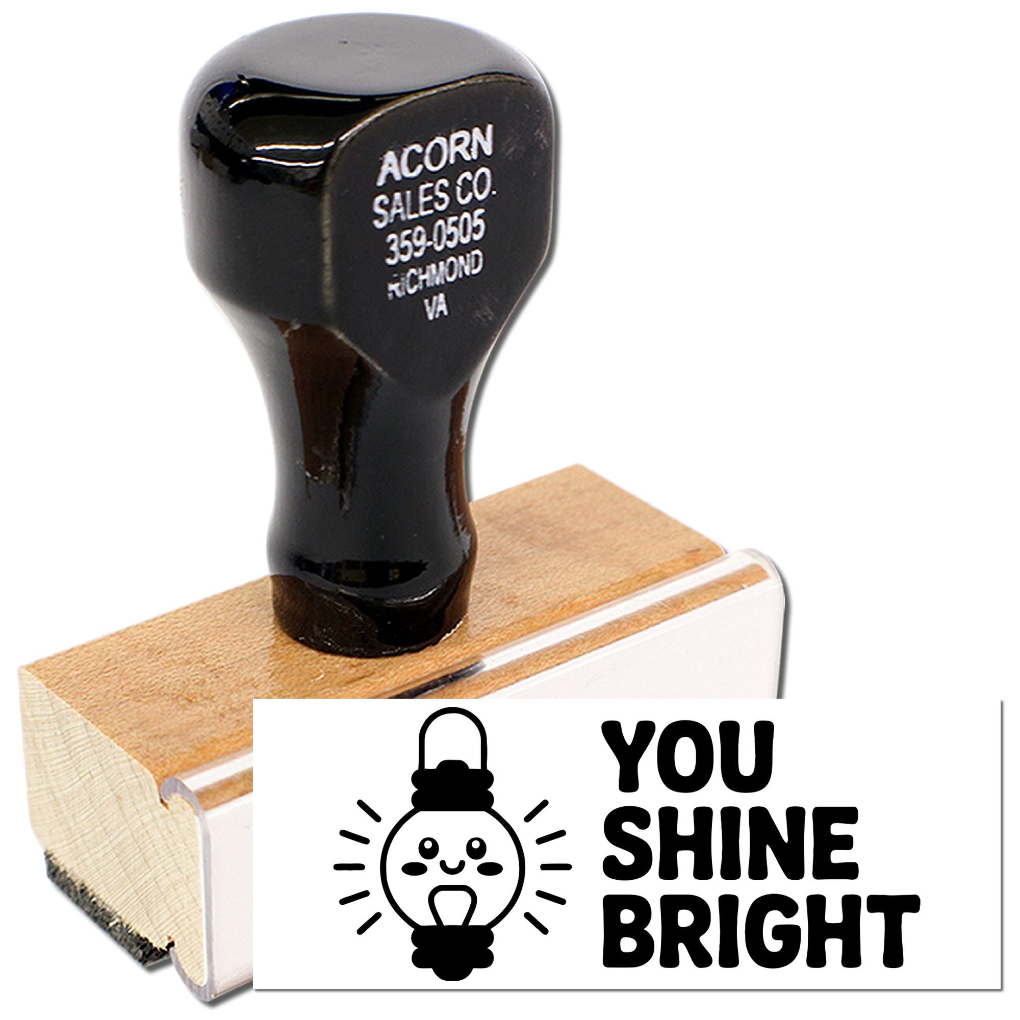Custom rubber stamp with wooden handle, featuring business address imprint and You Shine Bright design for branding.