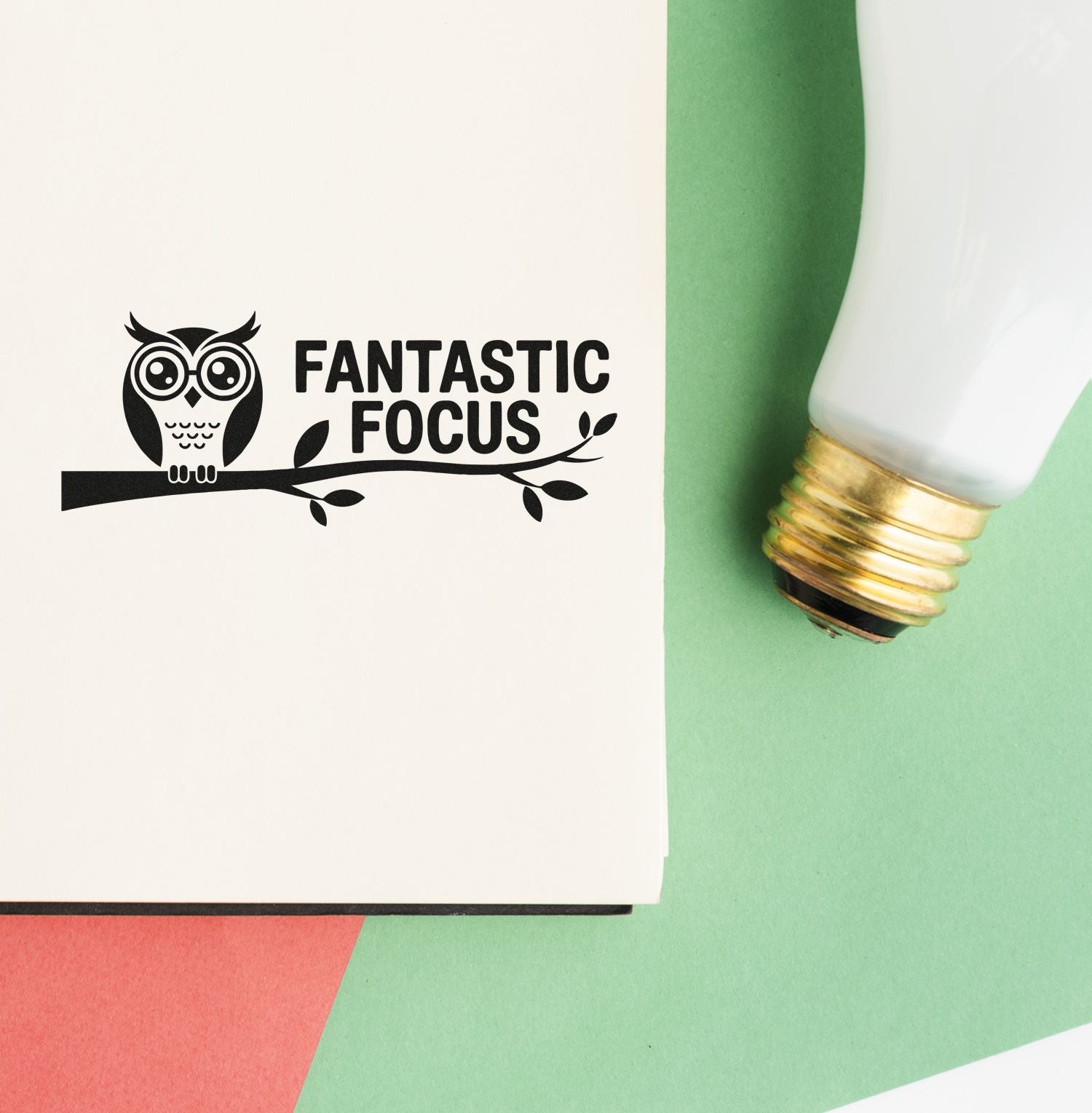 Custom rubber stamp impression with owl and Fantastic Focus design, ideal for motivational branding and stationery.
