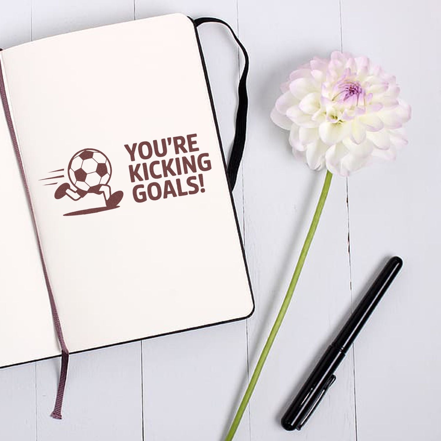 Soccer rubber stamp design reading Youre Kicking Goals! for sports-themed notebooks, cards, and craft projects.