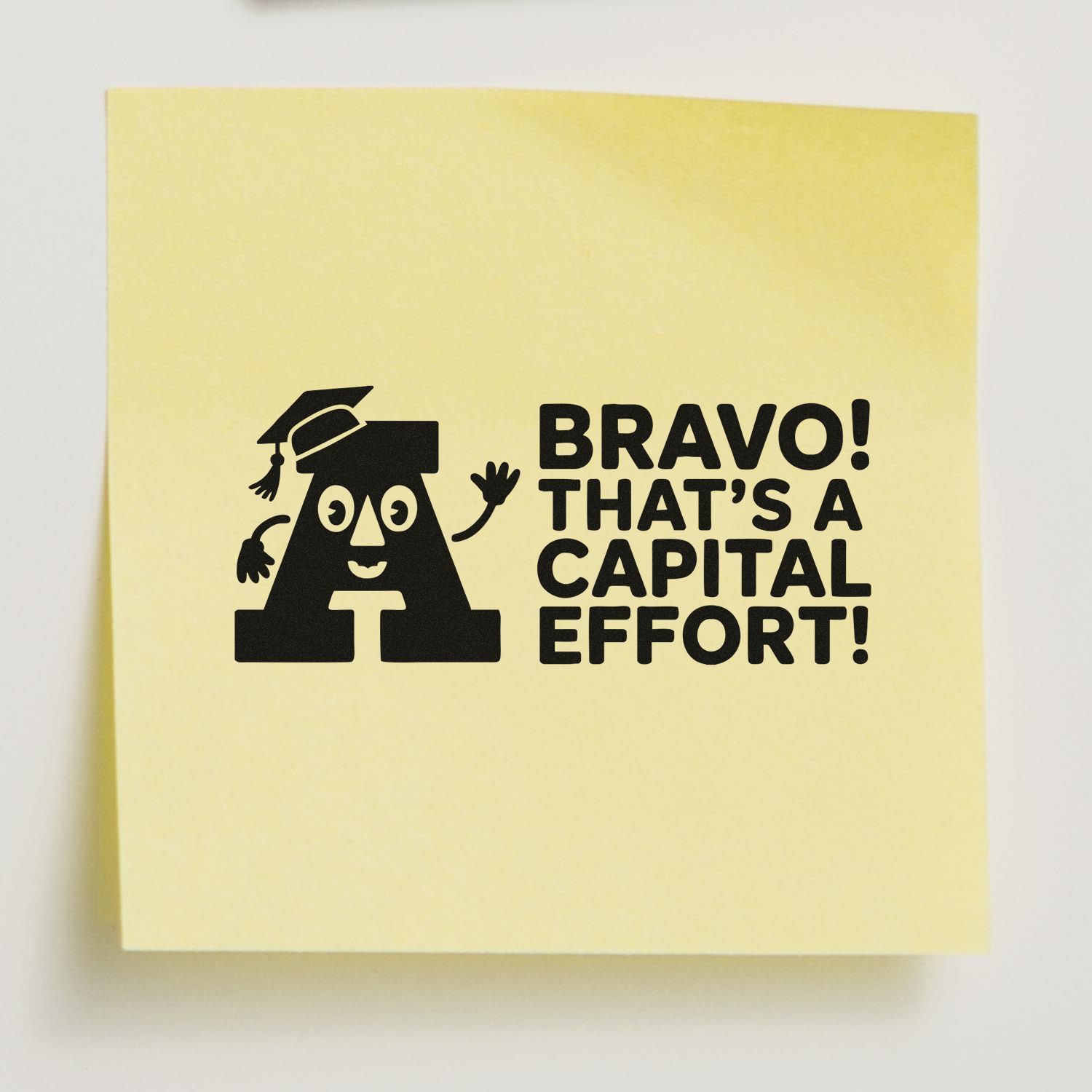 Custom rubber stamp design saying Bravo! Thats a capital effort! with a graduation cap letter A for school praise.