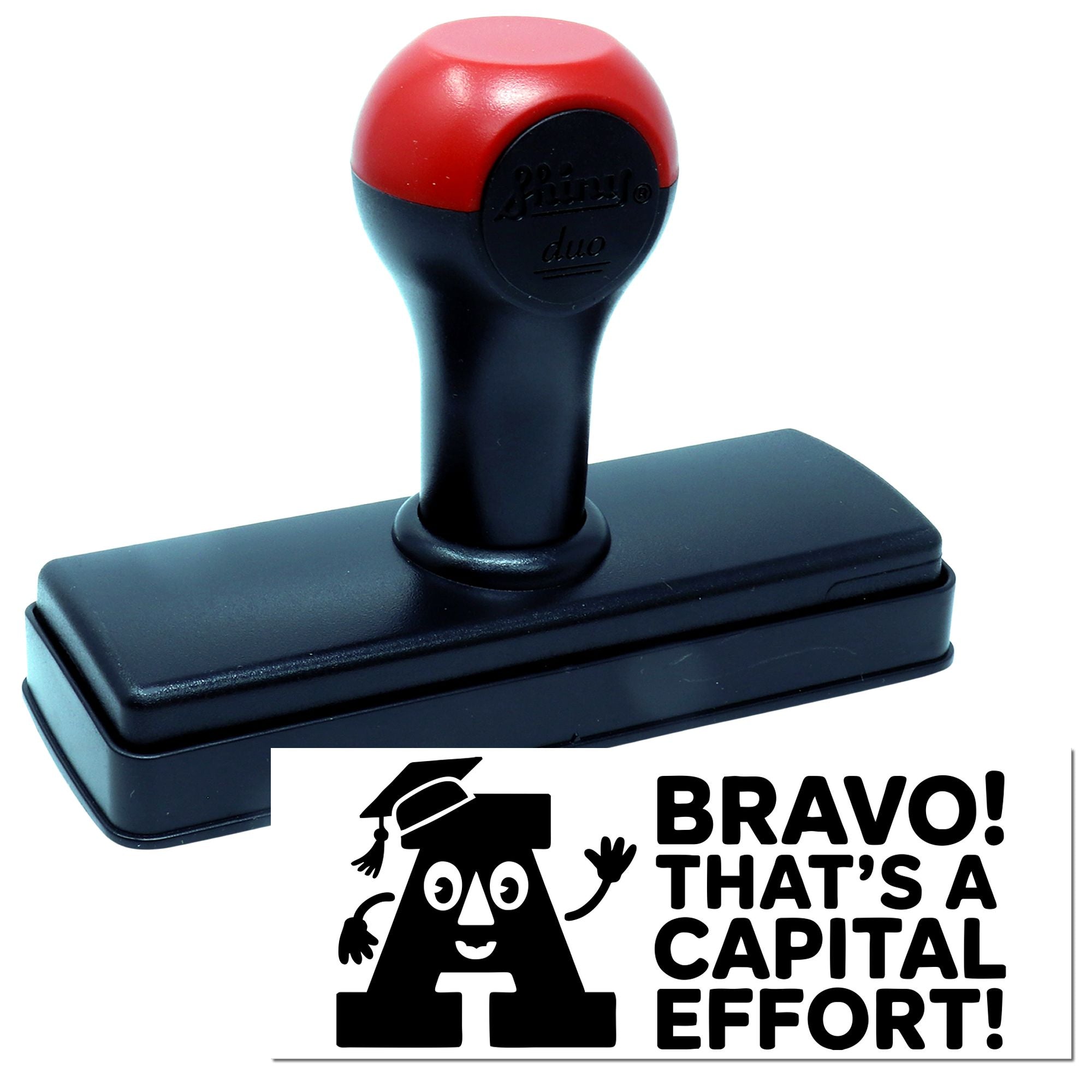 Self-inking rubber stamp with Bravo! Thats a capital effort! teacher appreciation design and bold alphabet stamp impression.