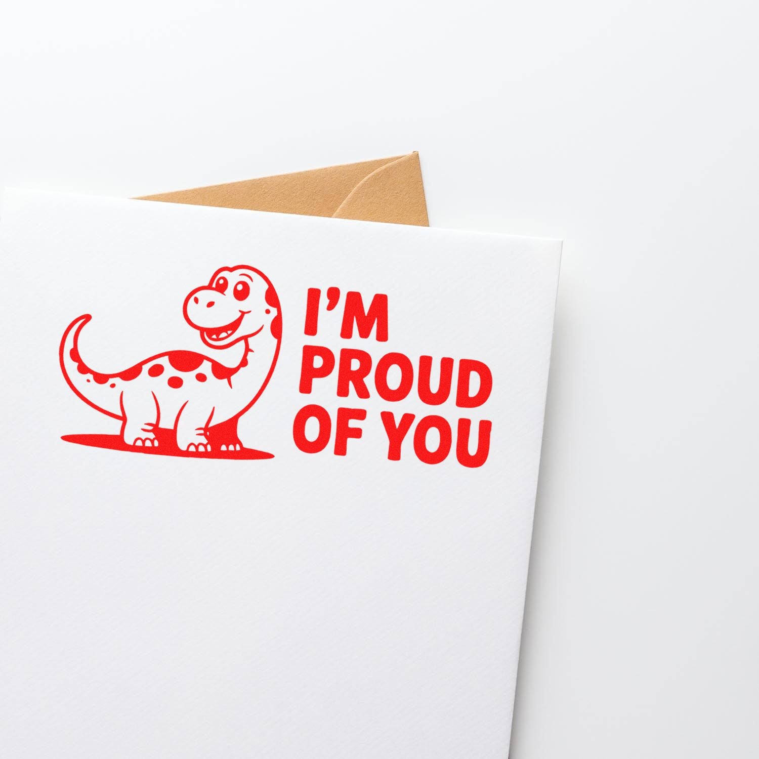 Custom dinosaur rubber stamp with Im proud of you message for uplifting greeting cards, gifts, and stationery.