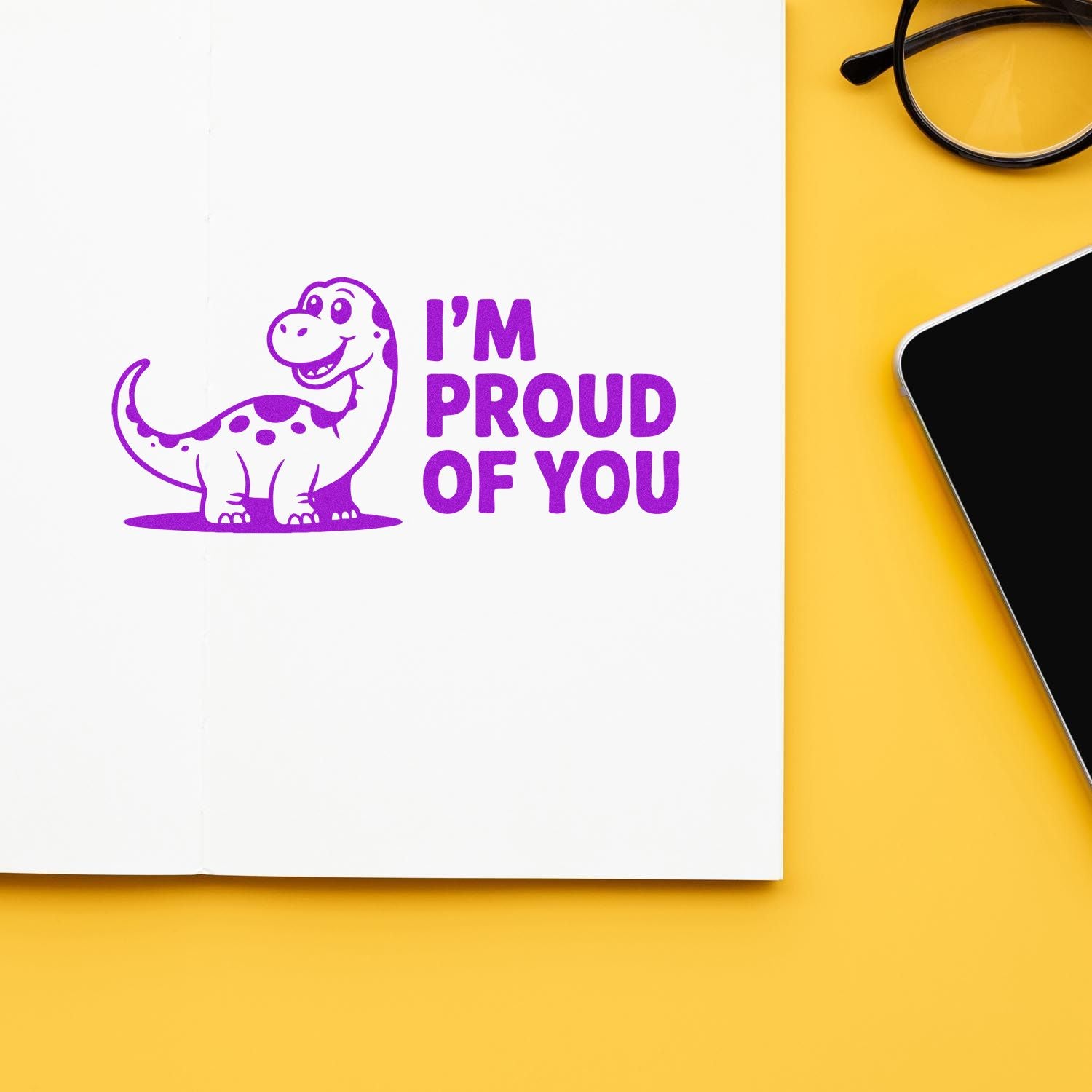Dinosaur Im Proud of You rubber stamp impression on notebook page, ideal for encouragement cards, teacher gifts, and crafts.