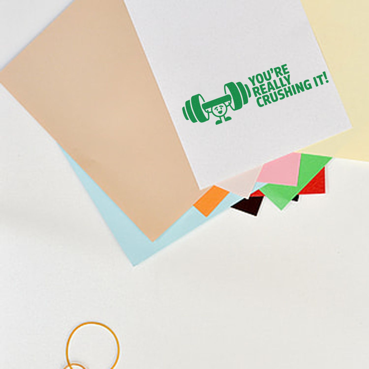 Green motivational rubber stamp reading Youre Really Crushing It! for fitness praise, reward cards, and packaging.