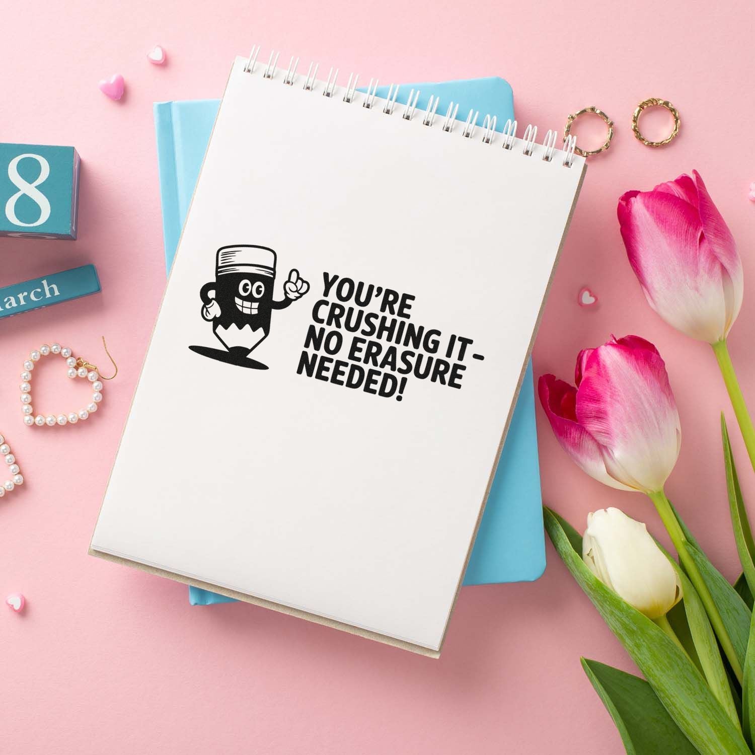 Motivational rubber stamp imprint on notebook reading Youre crushing itno erasure needed for planners, teachers, and crafts.