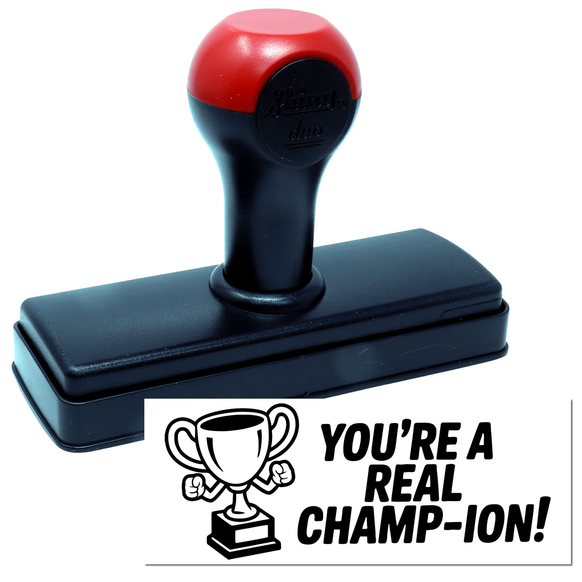 Custom self-inking rubber stamp with trophy design and Youre a real champ-ion! motivational imprint.