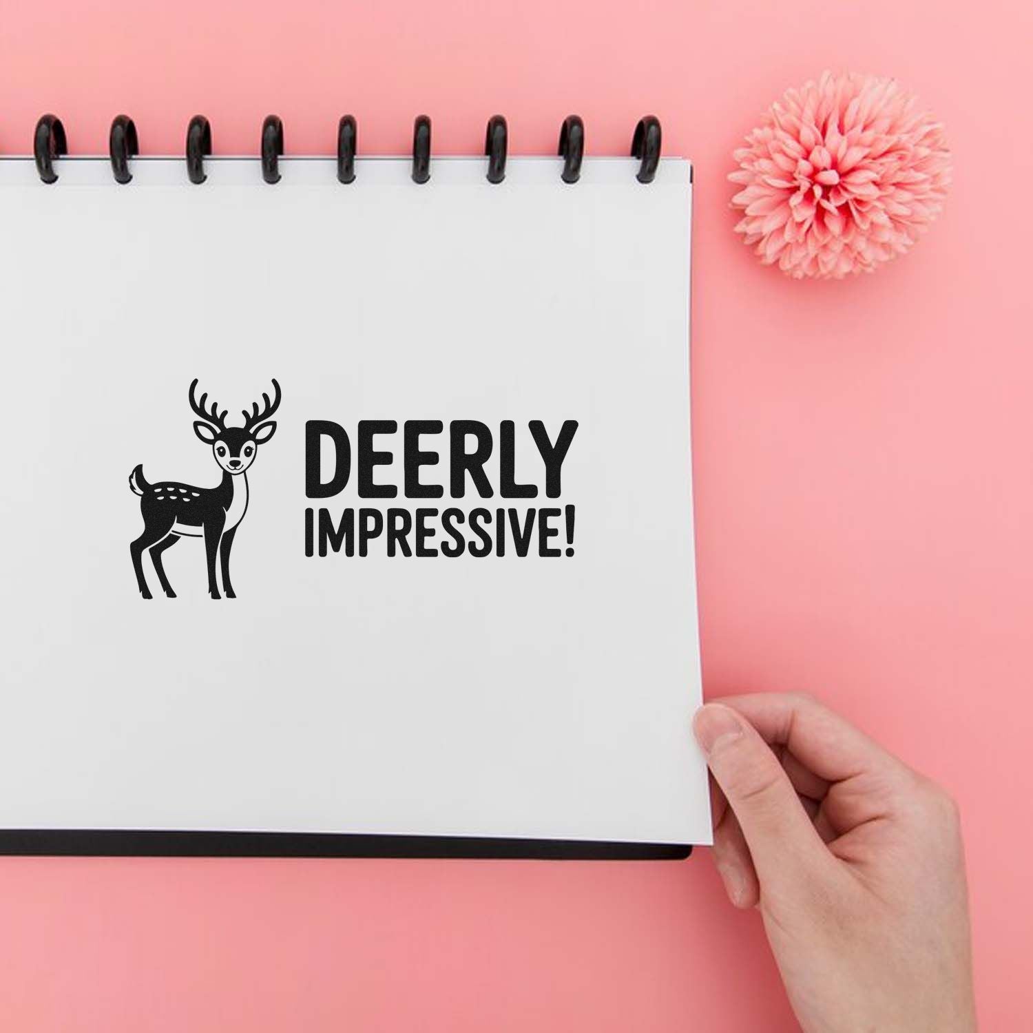 Deerly Impressive deer rubber stamp on a notebook page, ideal for playful stationery, journaling, and craft projects.