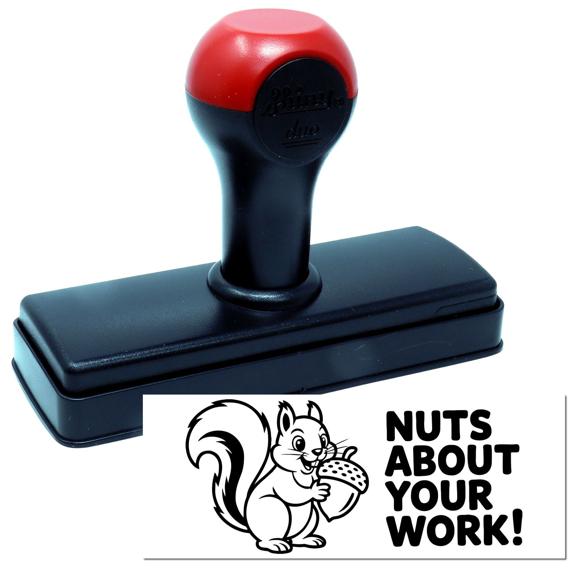 Self-inking rubber stamp with squirrel and acorn design reading Nuts About Your Work for office and craft use.