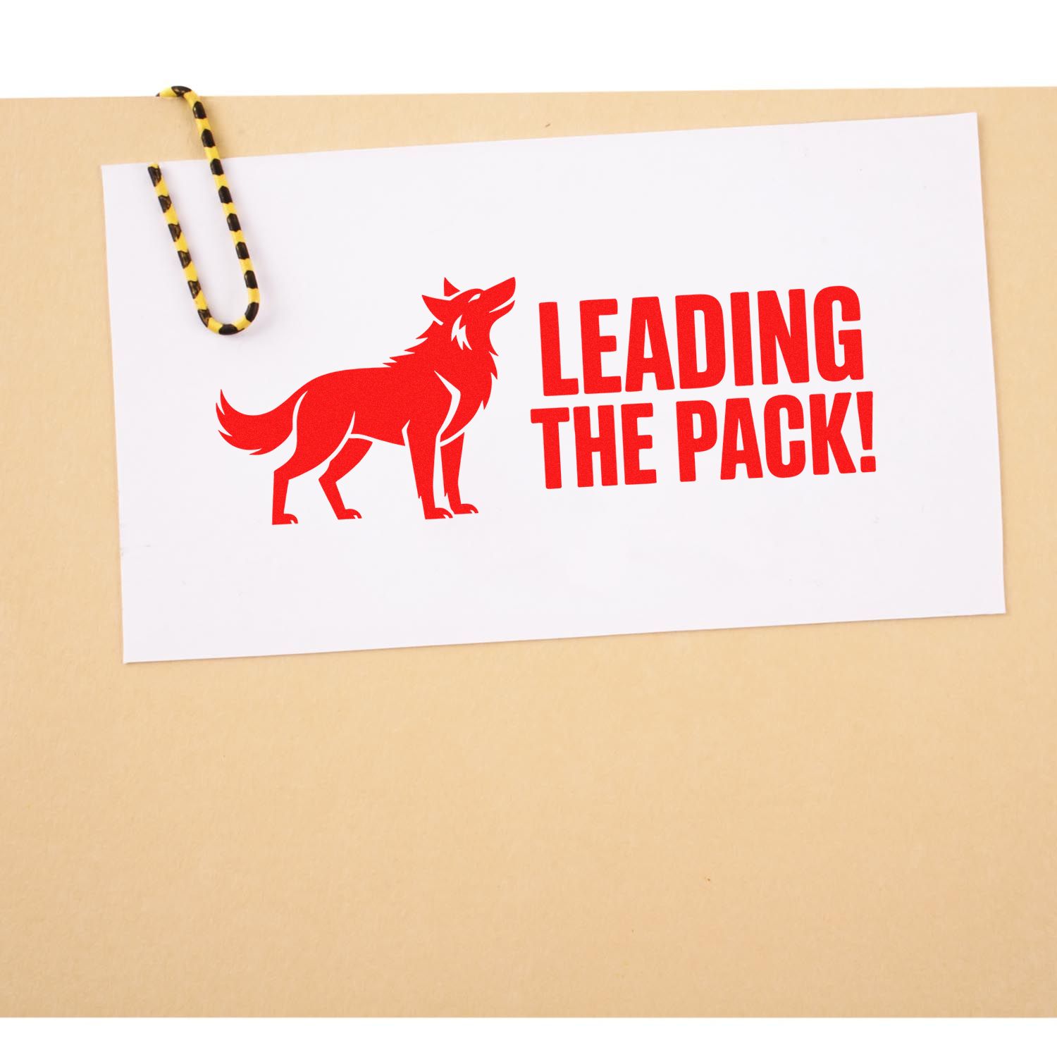 Red wolf Leading the Pack! rubber stamp design on white card, ideal for custom motivational or business stamping.