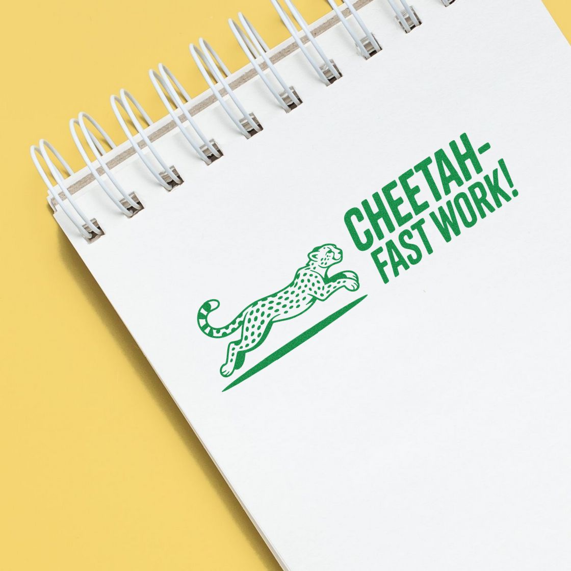 Custom rubber stamp reading Cheetah-fast work! with running cheetah graphic for fast office approvals.
